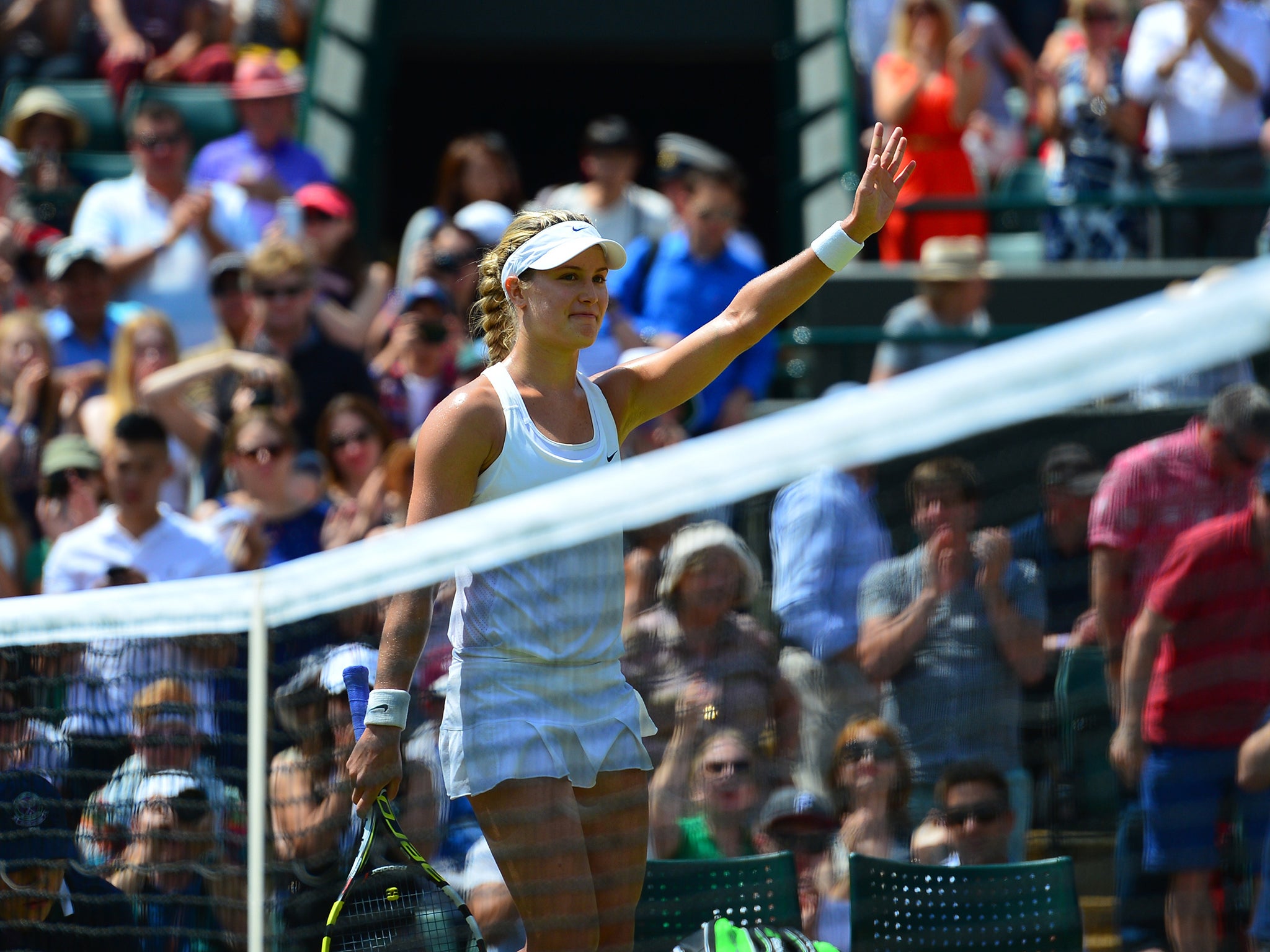 Canada's Eugenie Bouchard celebrates winning her women's singles quarter-final match against Germany's Angelique Kerber