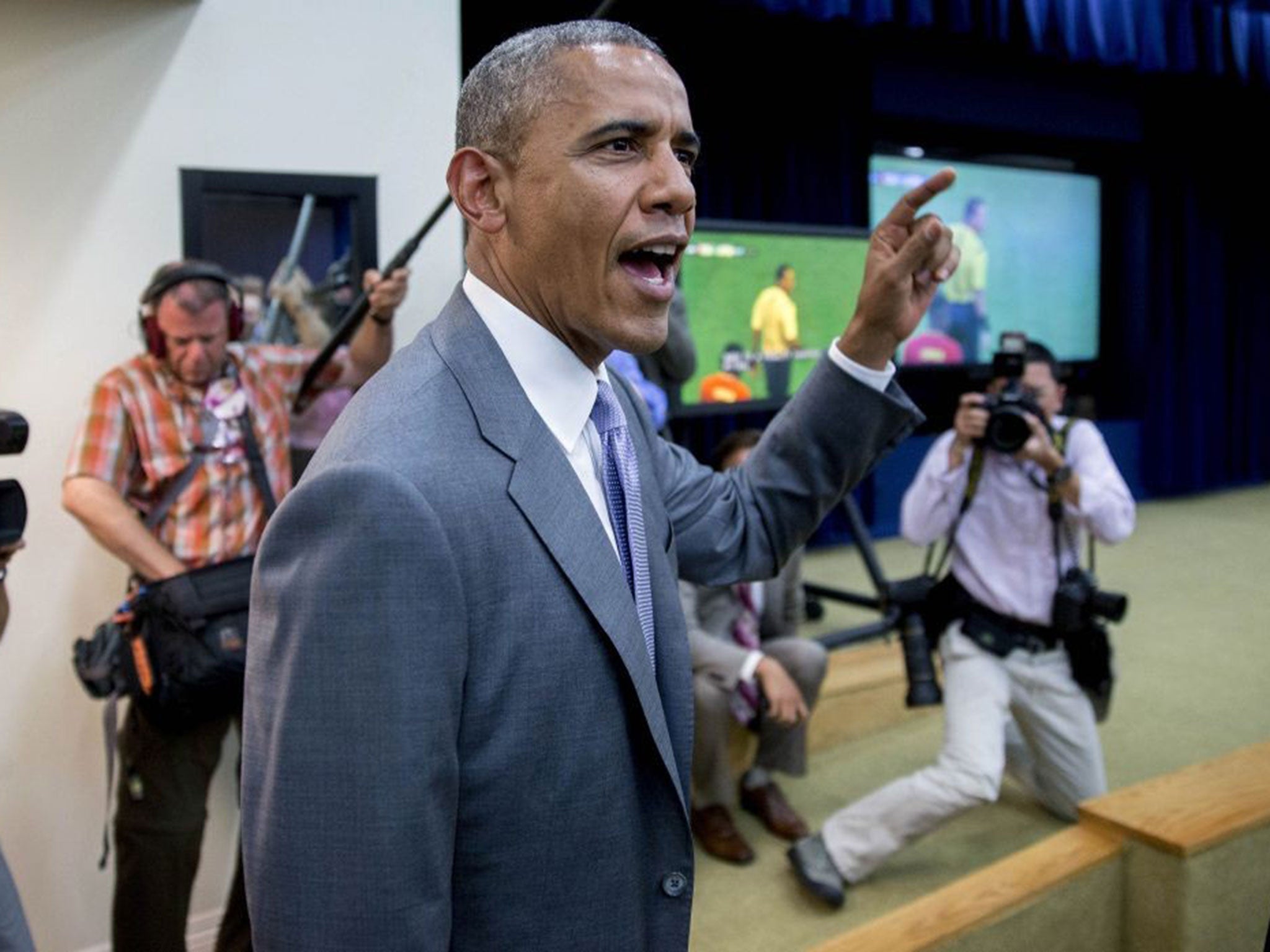 President Obama leads a chant of "I believe that we will win"