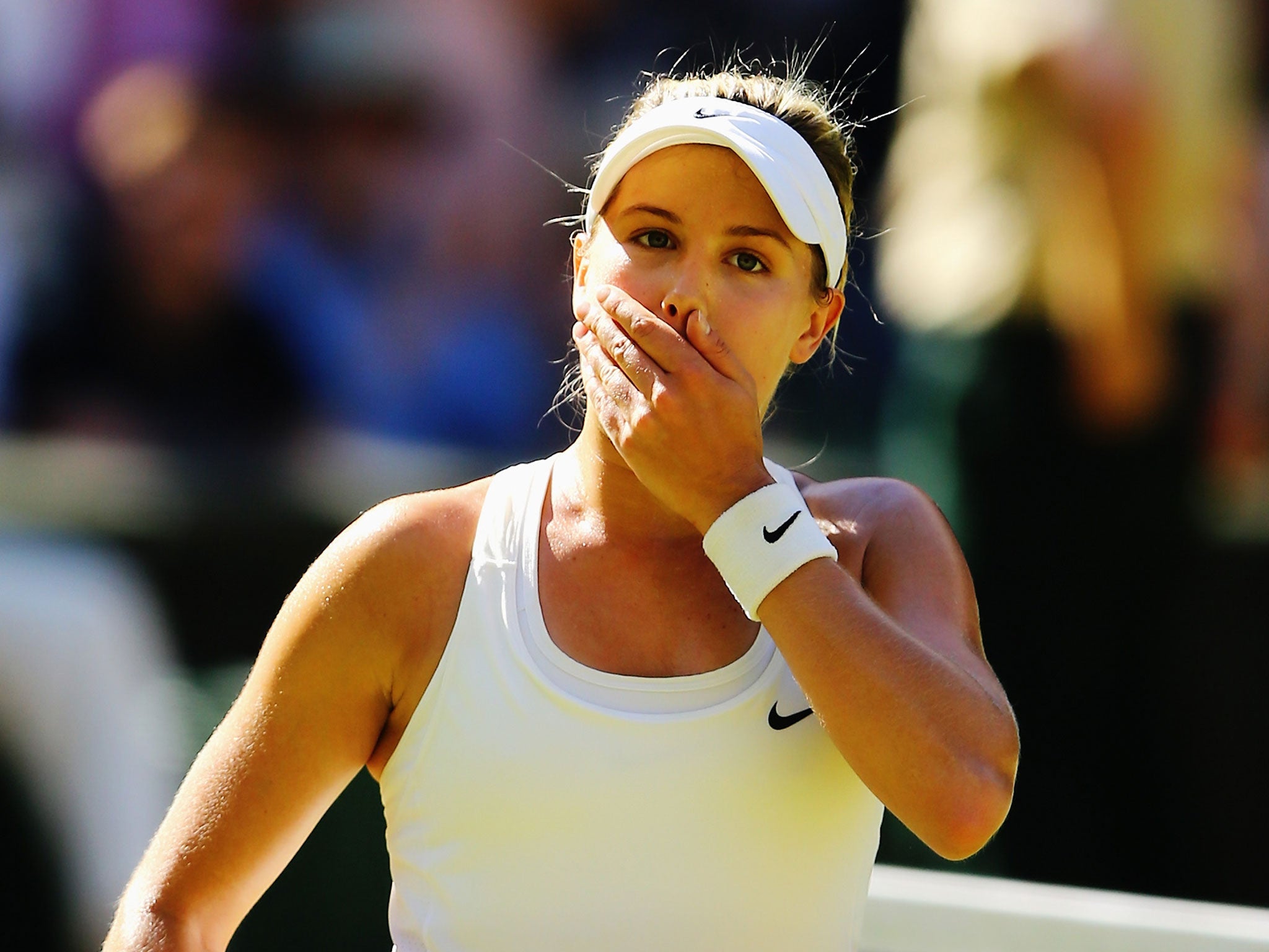 Eugenie Bouchard looks shocked after her semi0-final win over Simona Halep