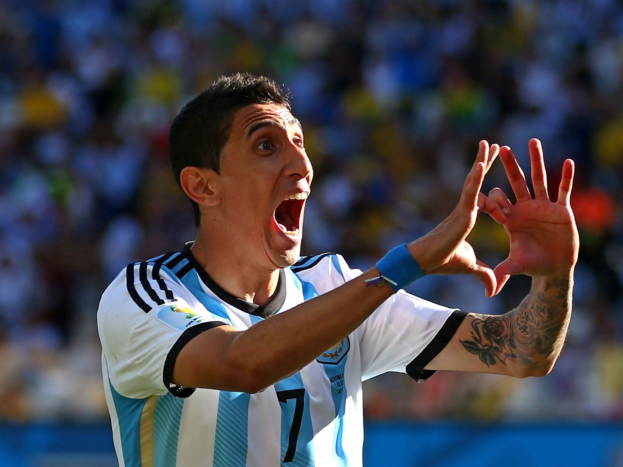 Angel Di Maria celebrates after scoring Argentina's winner against Switzerland