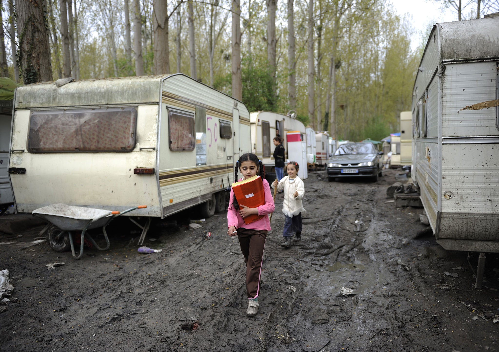 Roma children, as here in a camp in Corbeil-Essonnes, outside Paris, are being schooled and then evicted