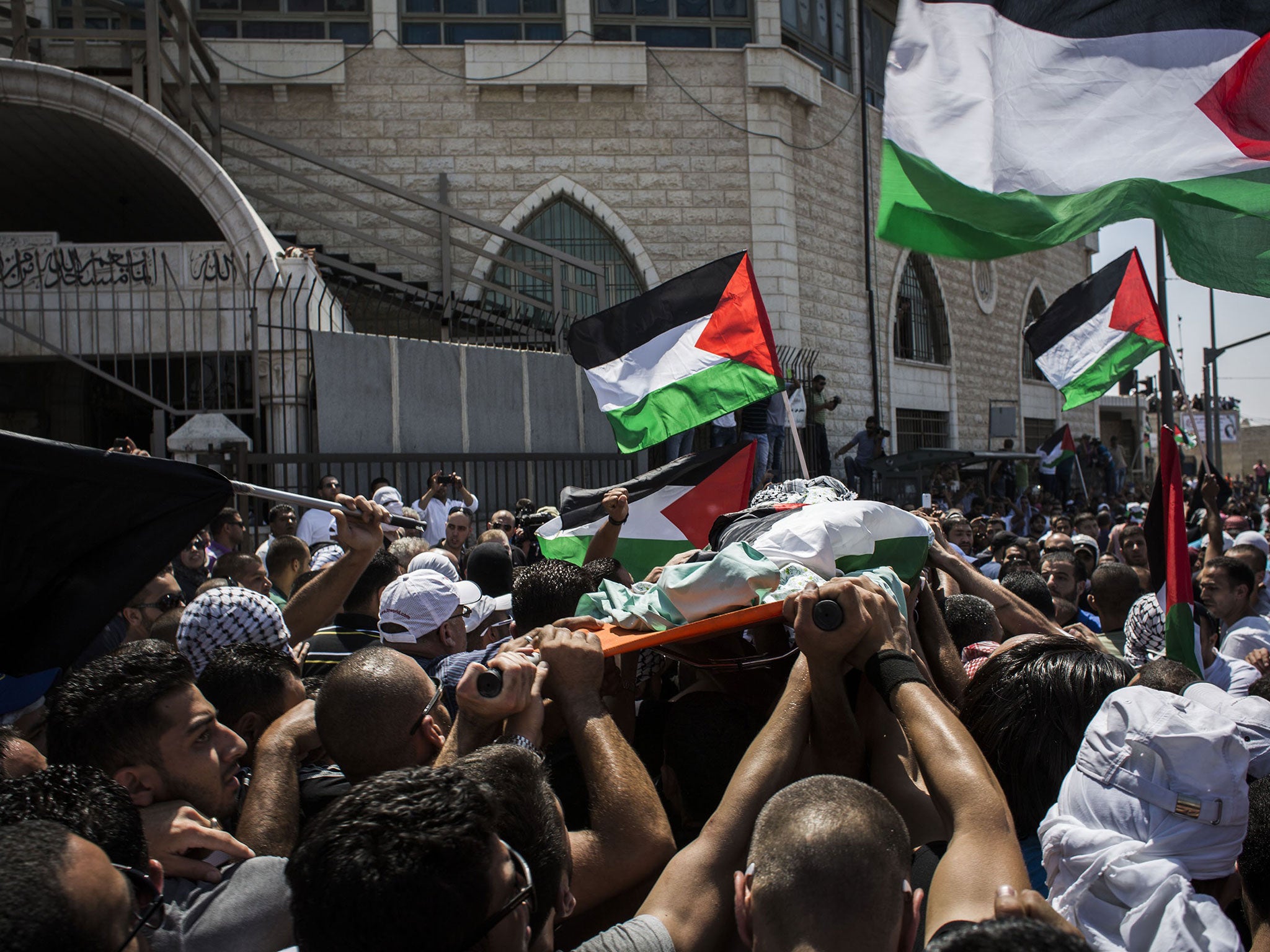 The funeral of Mohammed Abu Khdeir in East Jerusalem in 2014, where there were violent clashes