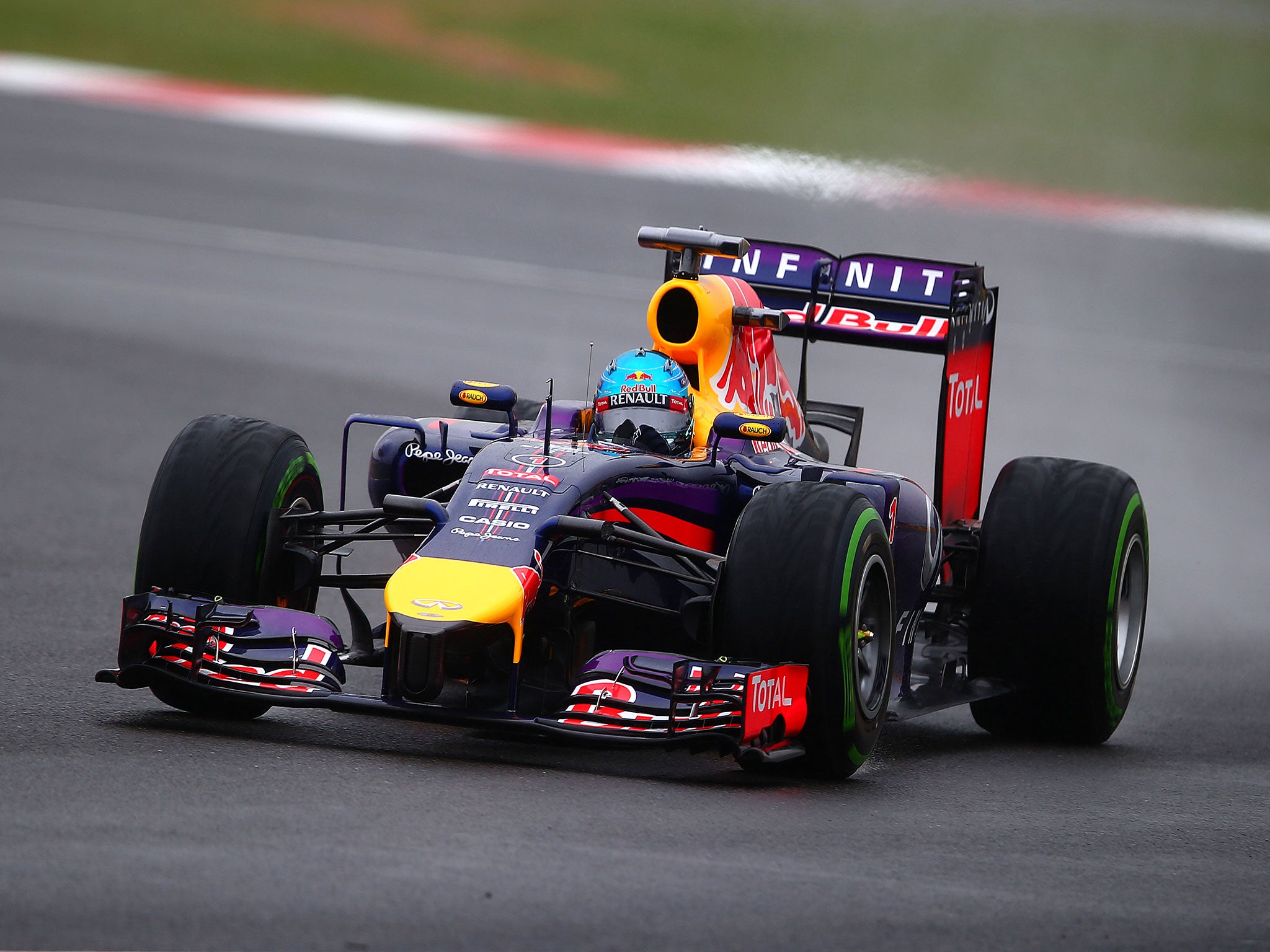 Sebastian Vettel was fastest in the rain-hit final practice session at Silverstone