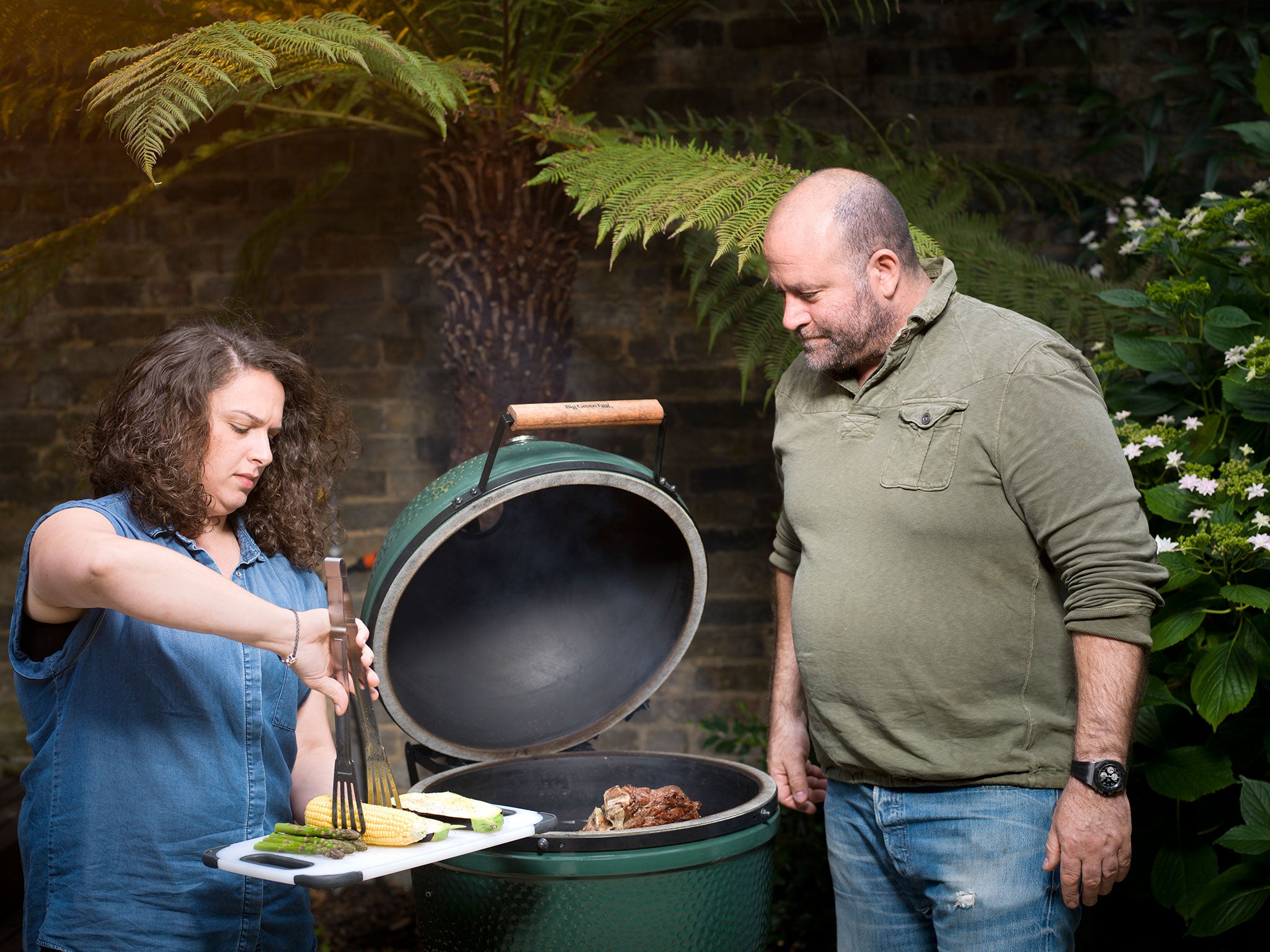 The duo get ready to grill at Richard Turner's house