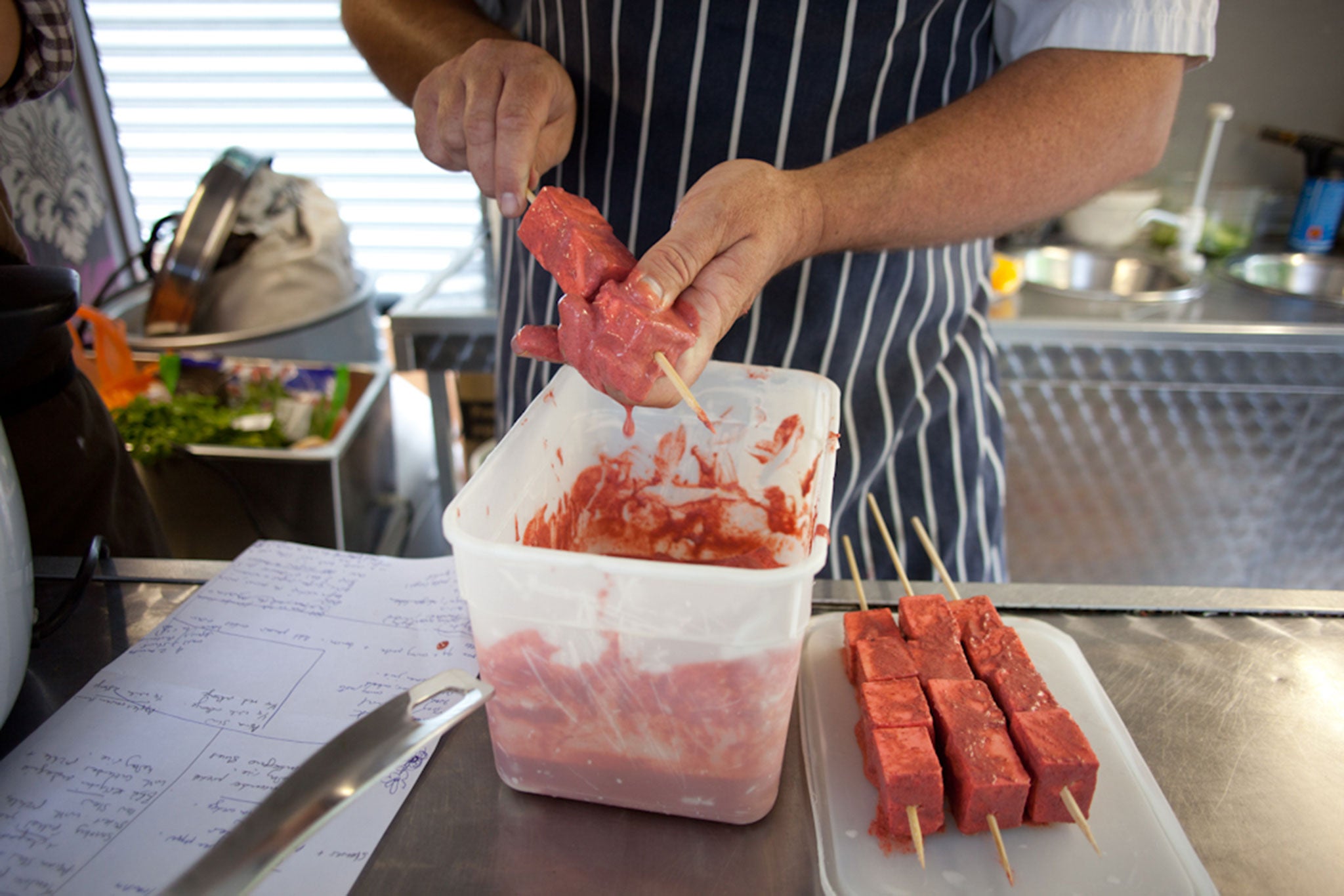 David prepares the tandoori paneer kebabs