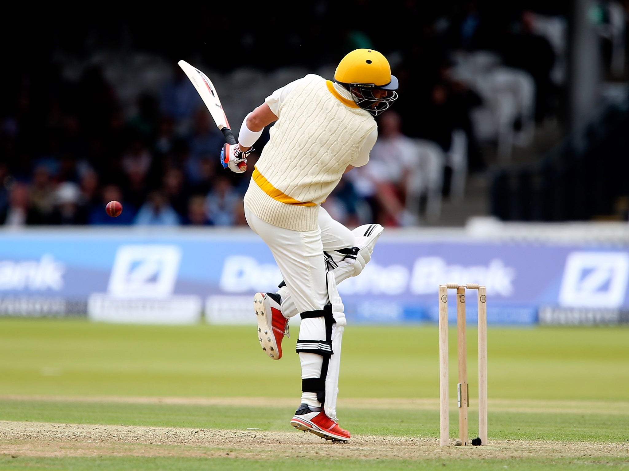 Shane Warne is hit by a Brett Lee ball during the MCC's match against the est of the World