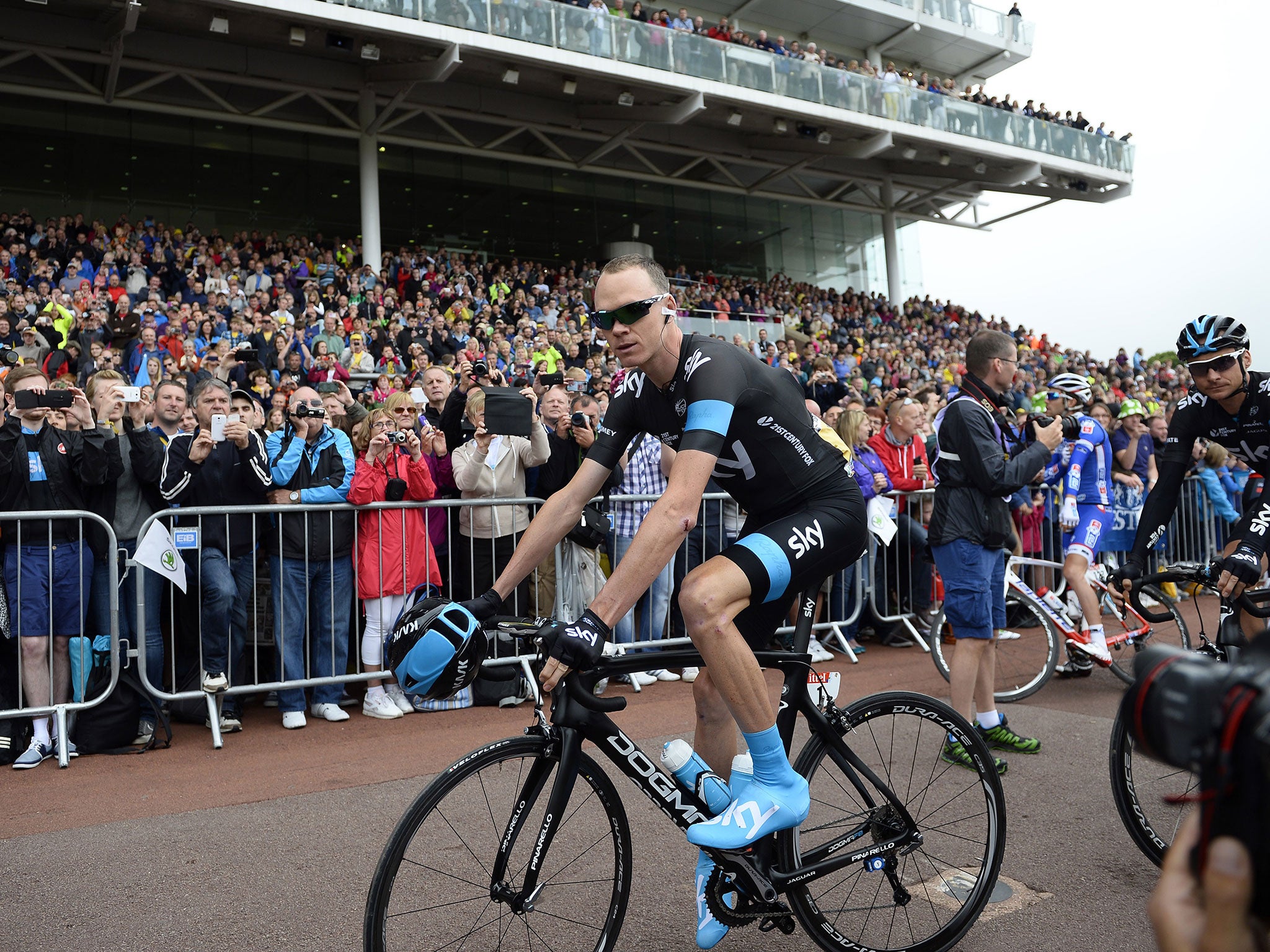 Britain's Christopher Froome arrives for the signature ceremony prior to the beginning of the 201 km second stage of the 101th edition of the Tour de France