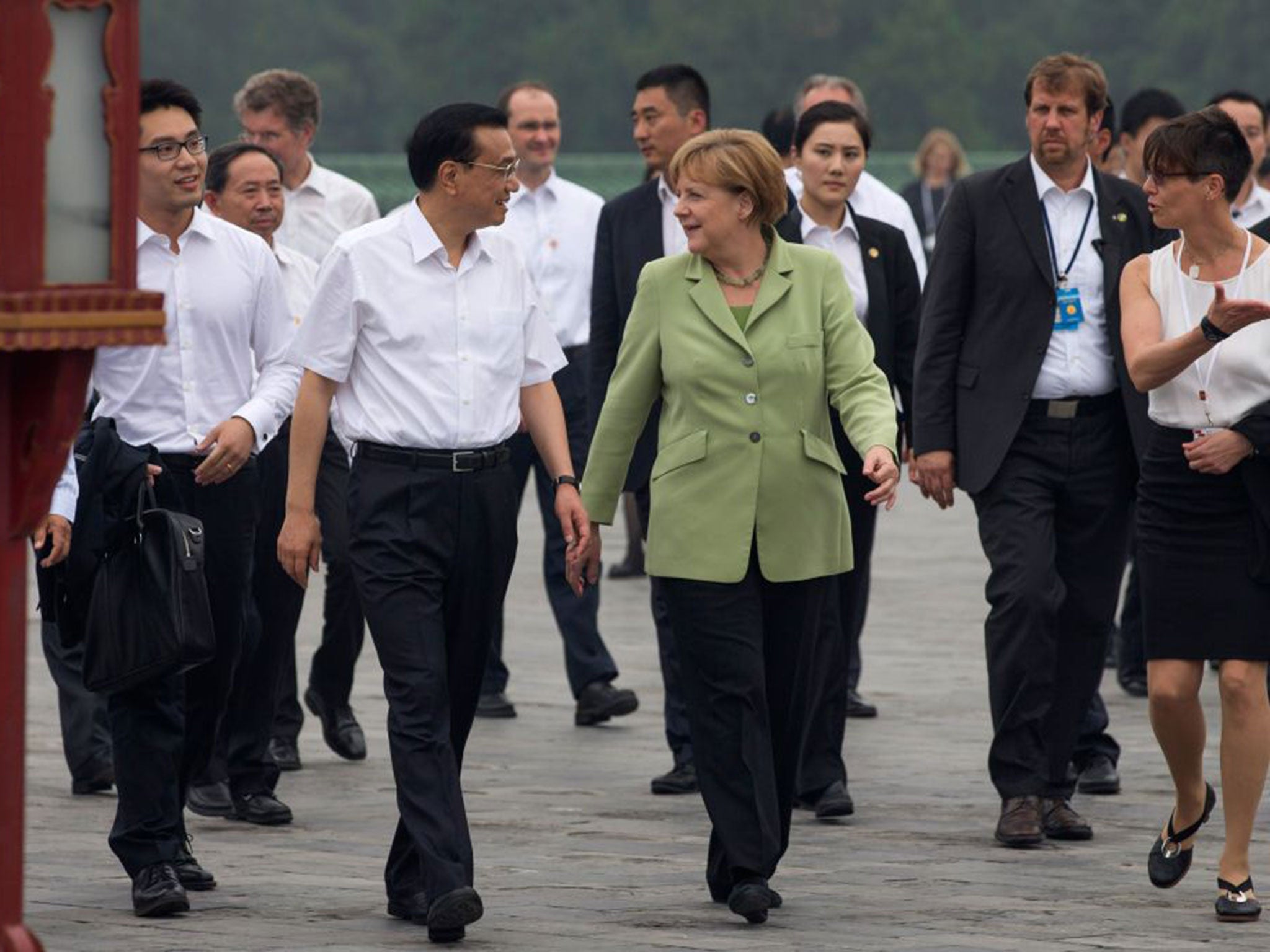 Angela Merkel met Premier Li Keqiang in China to promote economic ties