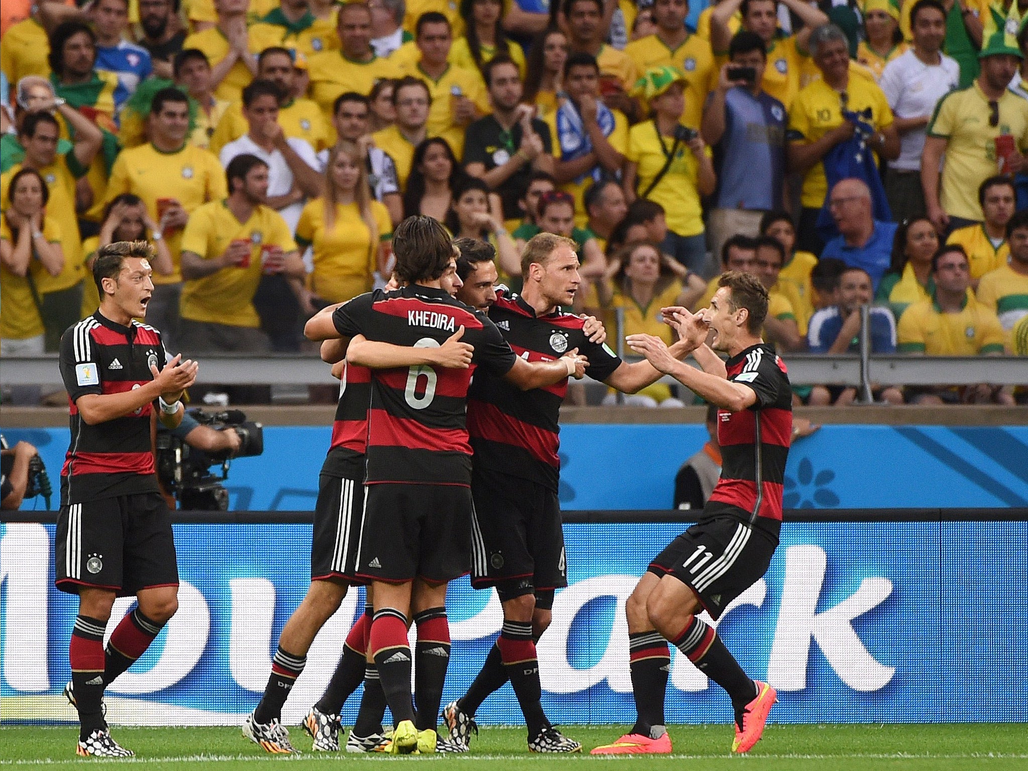 The German players celebrate one of their seven goals (Getty)