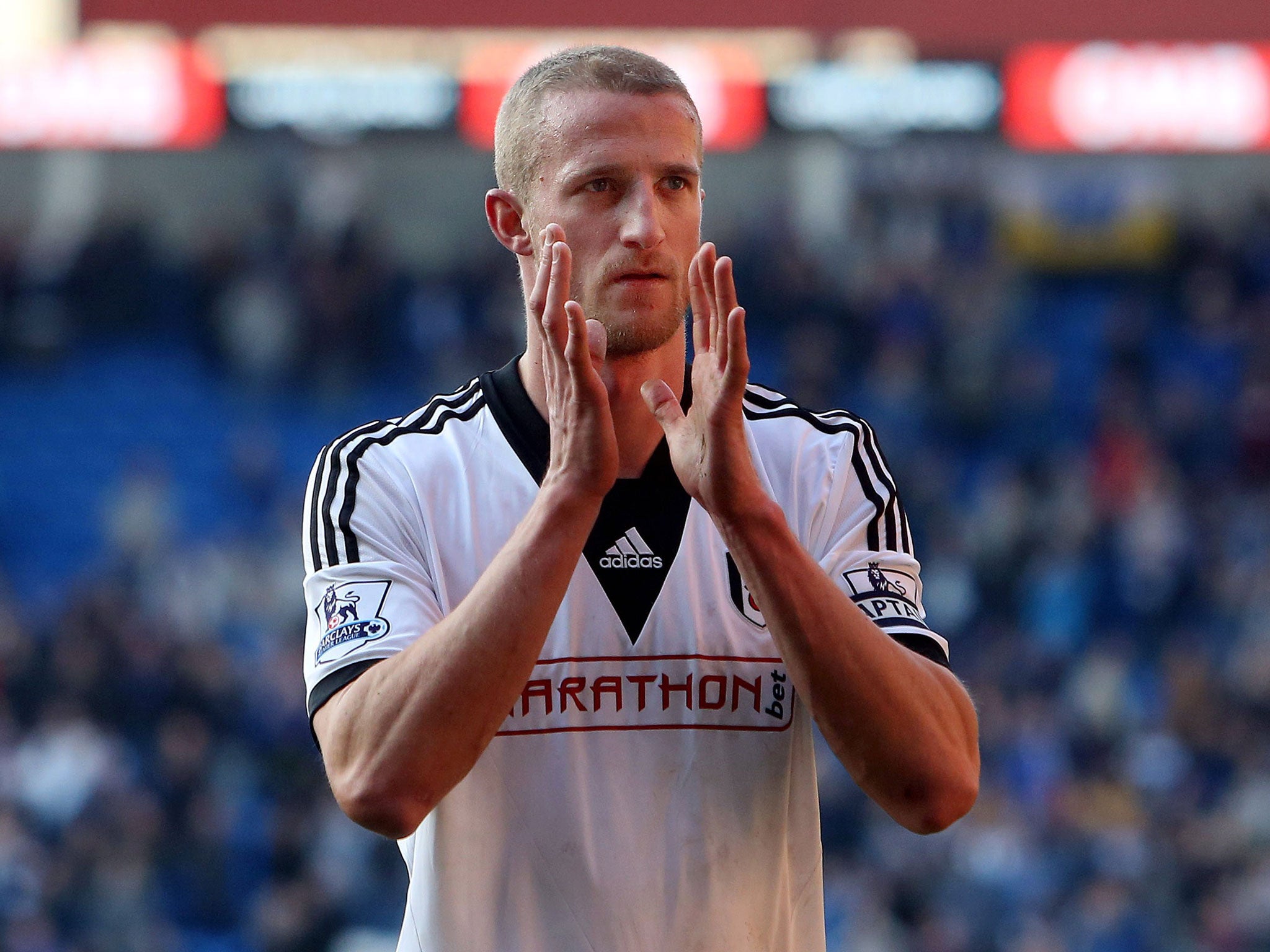 Brede Hangeland applauds supporters during his time at Fulham