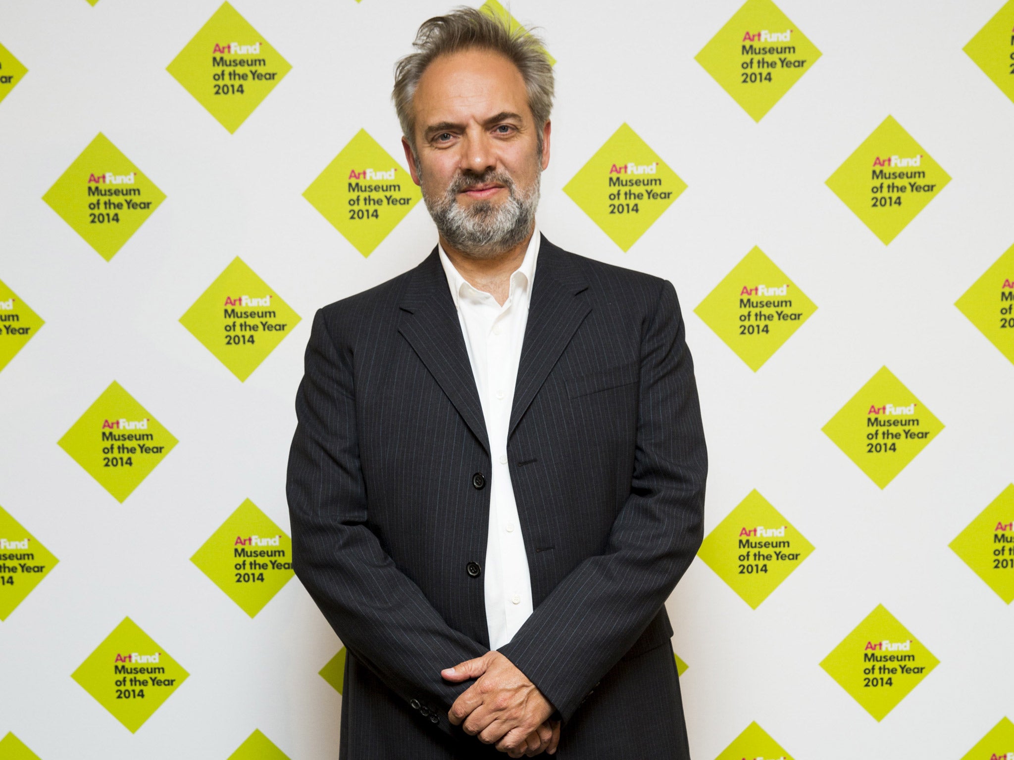 Film director Sam Mendes arrives at the ceremony (Getty)