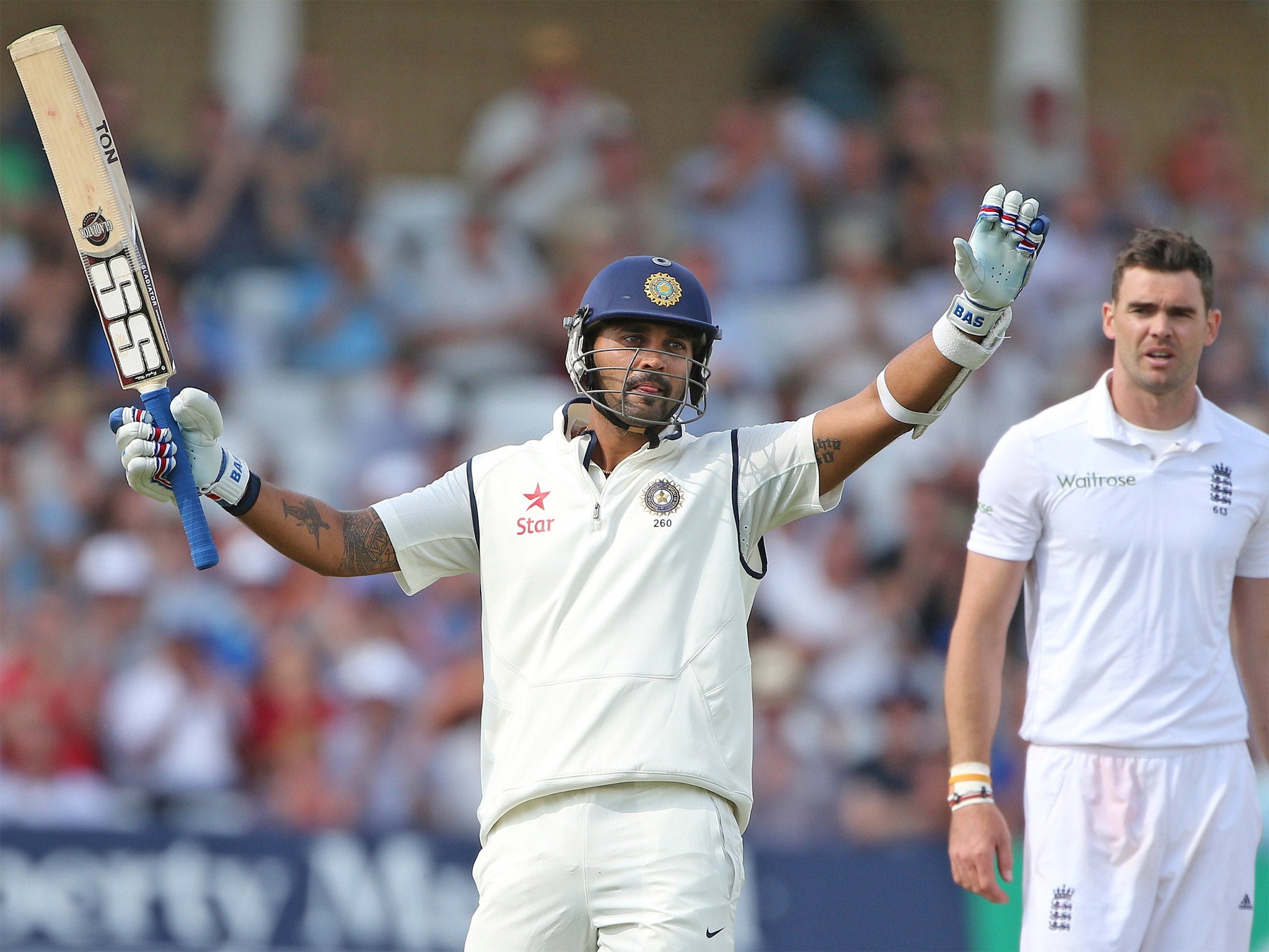 Murali Vijay raises his bat after reaching his century at Trent Bridge