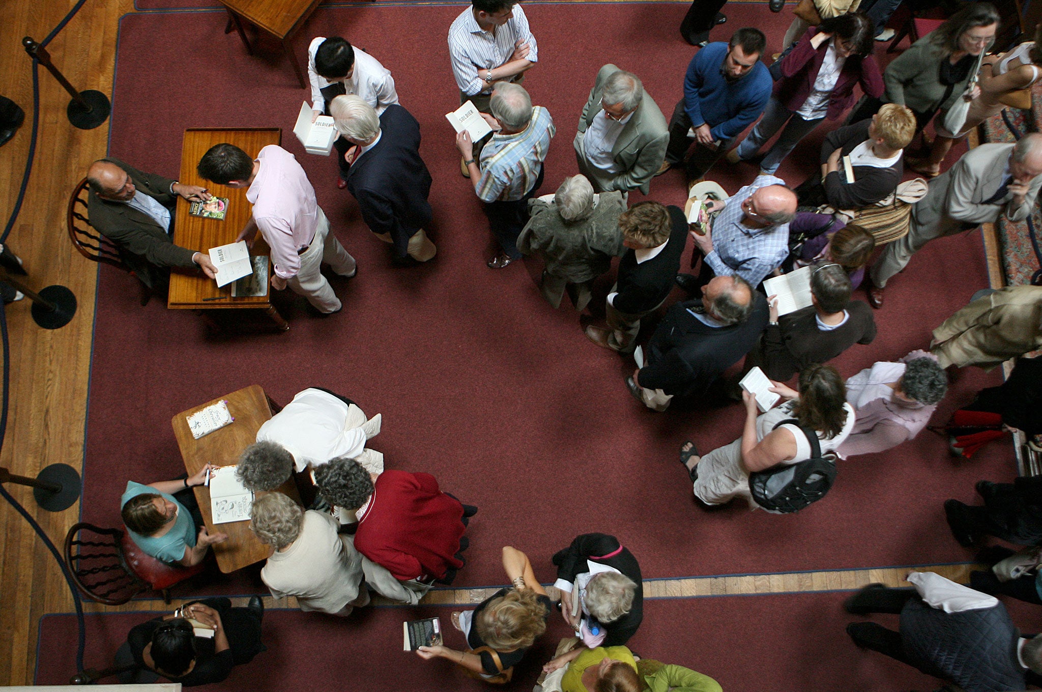 Bookish crimes: literary festivalgoers, queuing at a book signing