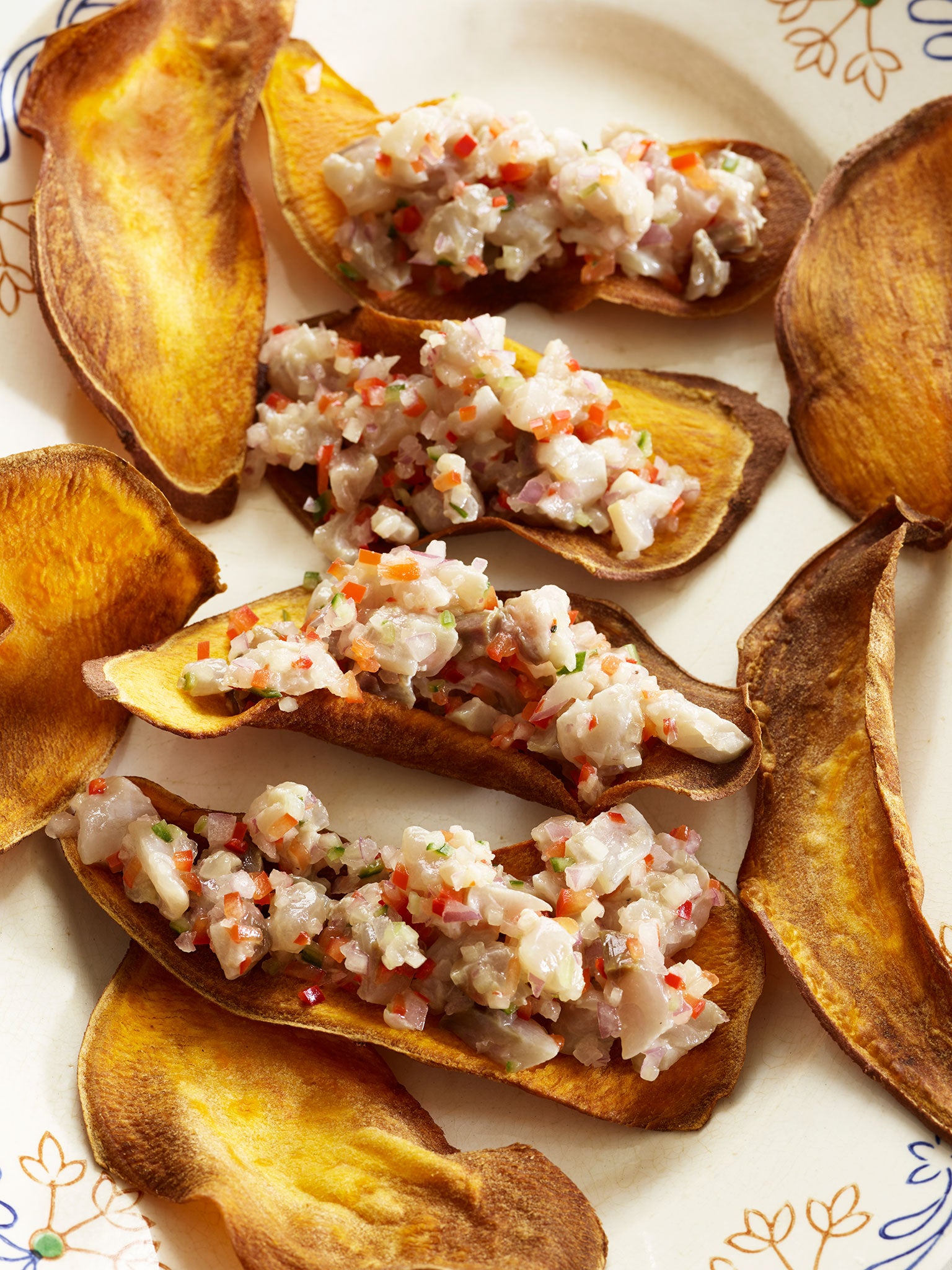 Mackerel ceviche with cucumber and sweet potato crisps