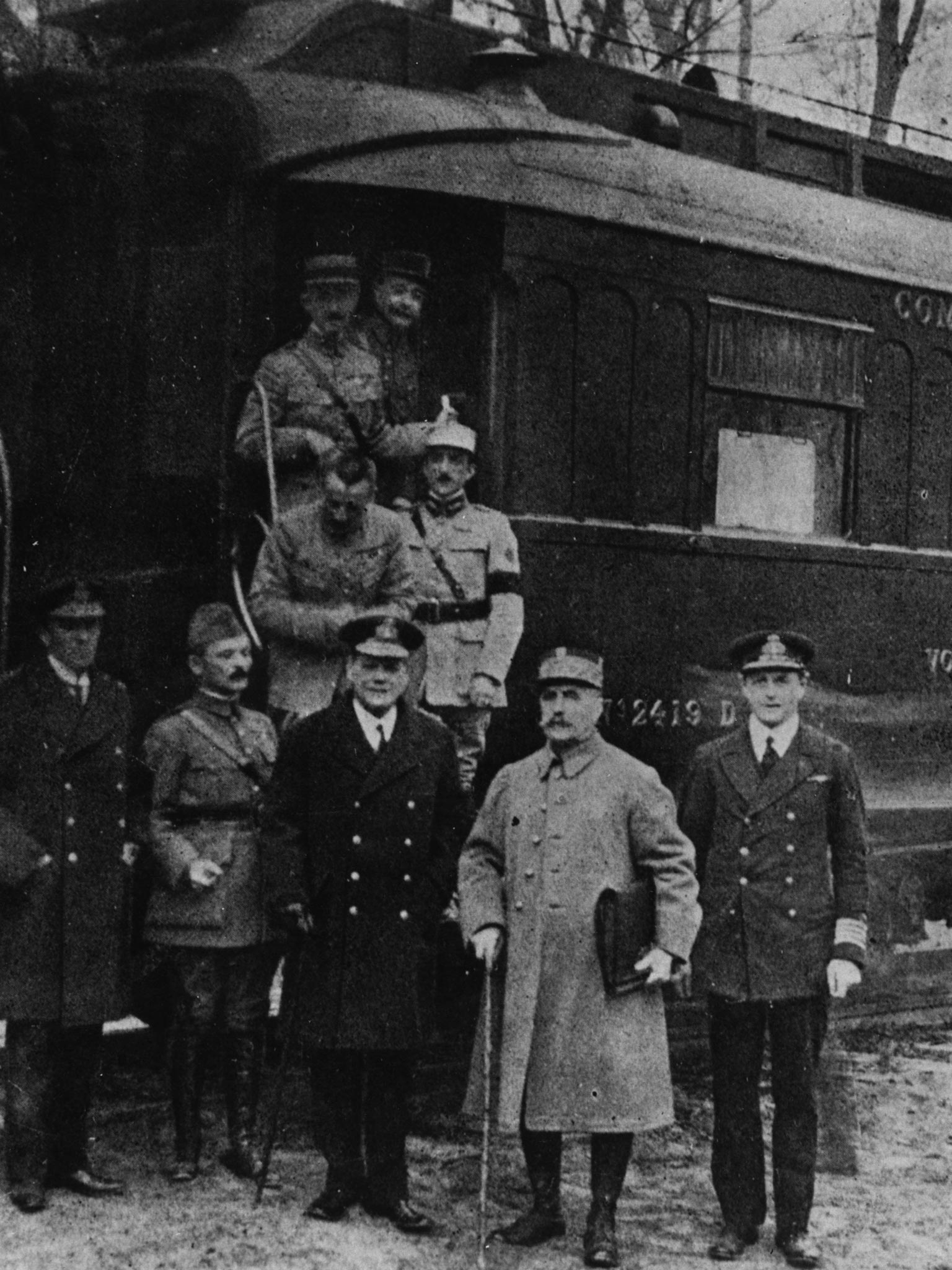 The Allied delegation was led by France’s Marshal Ferdinand Foch (front row, second right)