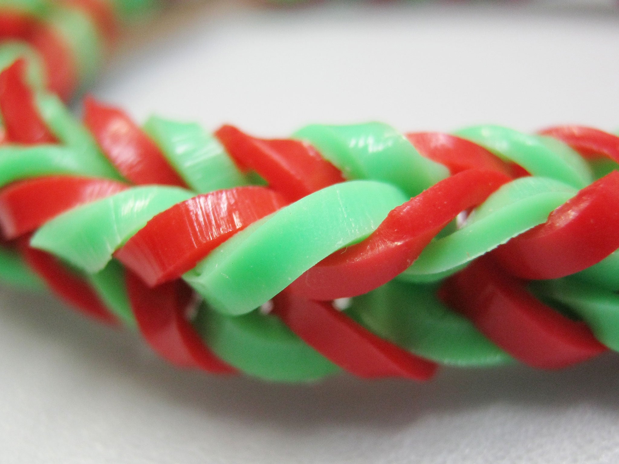 A green and red loom band bracelet