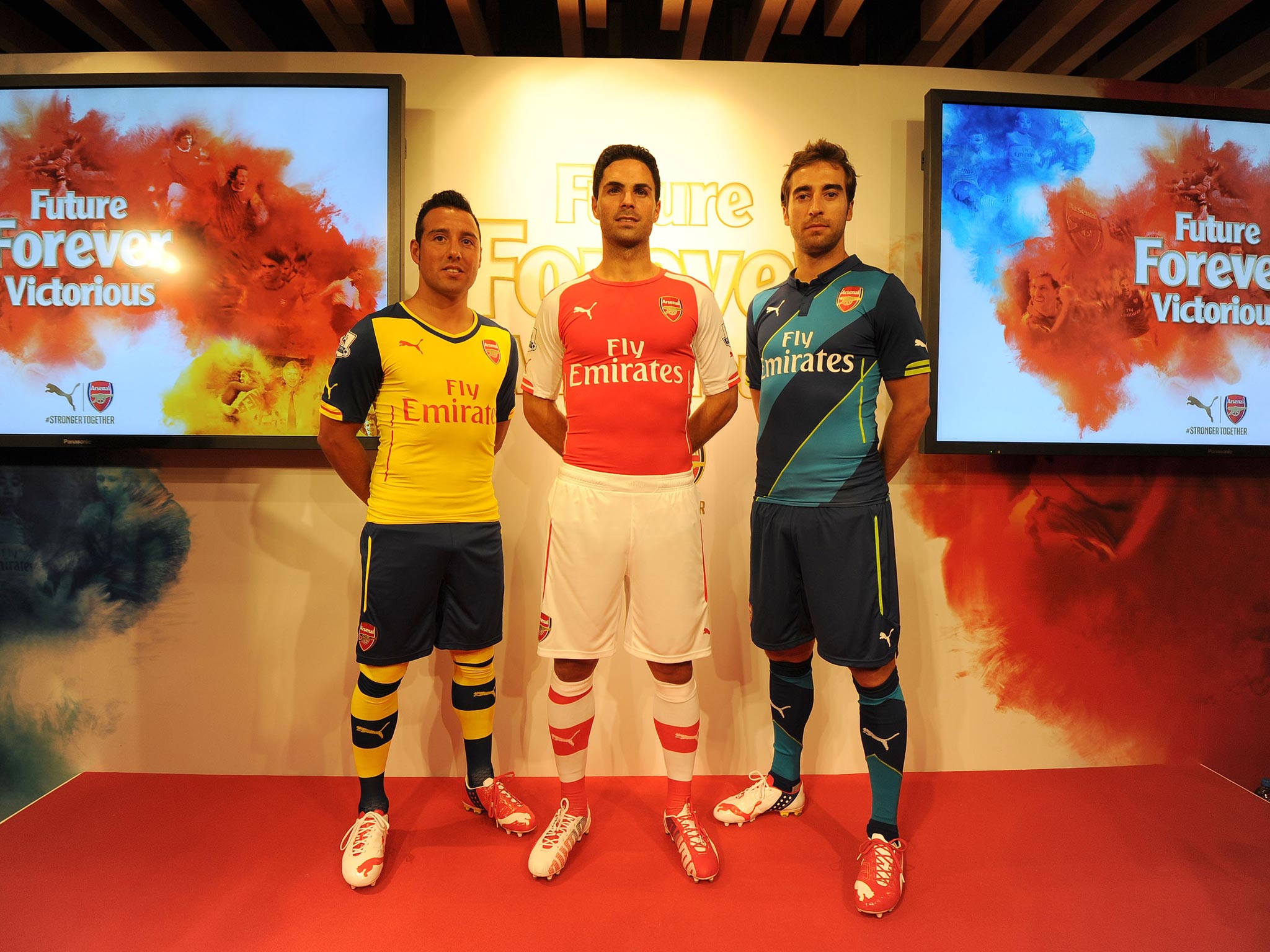 Santi Cazorla, Mikel Arteta and Mathieu Flamini of Arsenal launch the new Puma Arsenal kits at the Puma Store on Carnaby Street