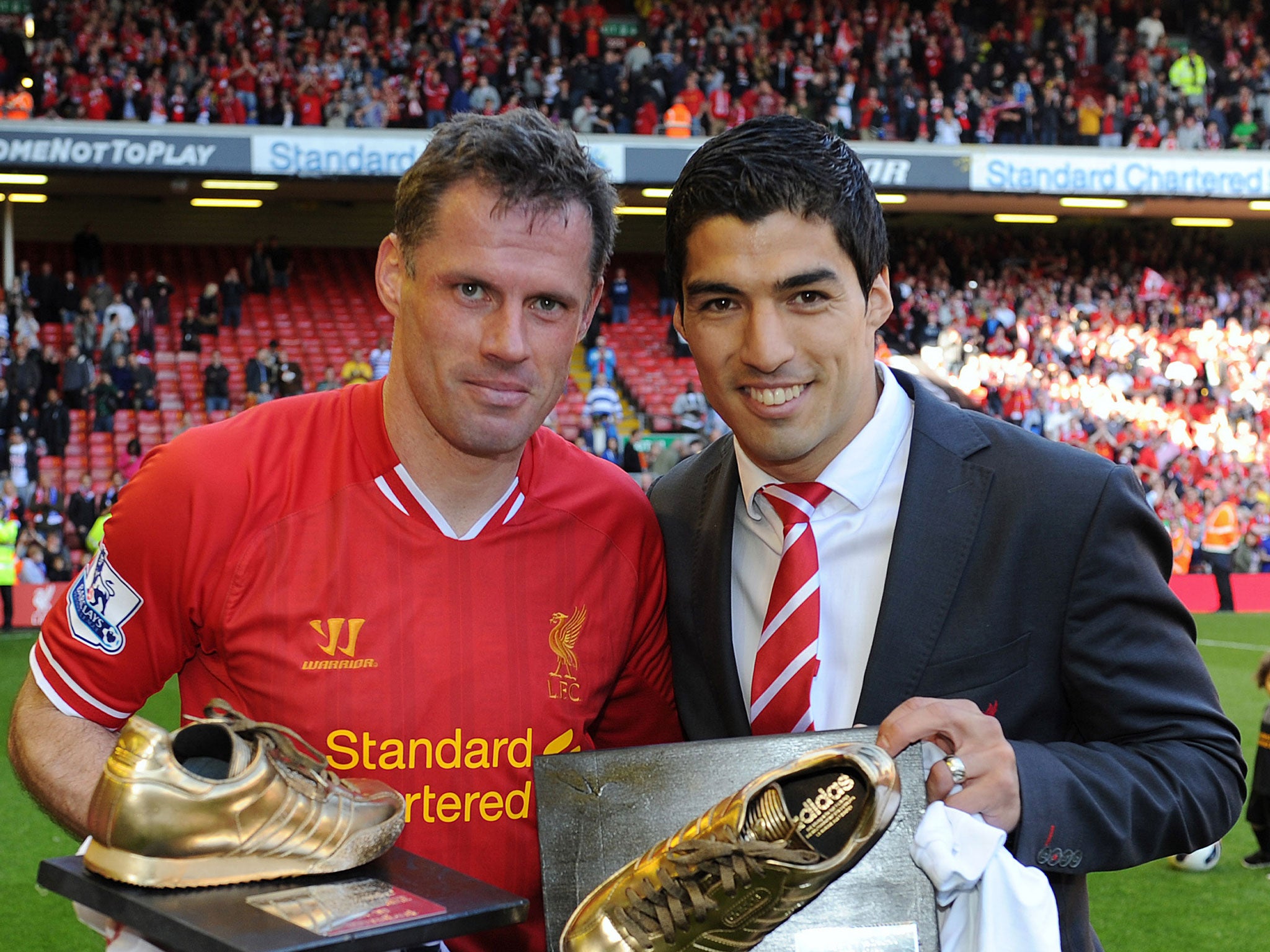 Jamie Carragher and Luis Suarez