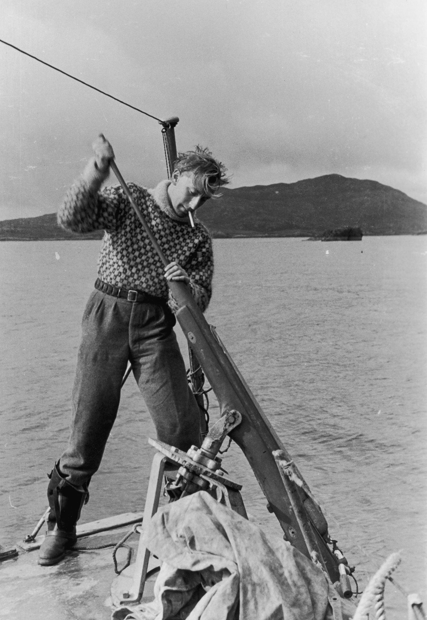 Gavin Maxwell loads a harpoon: he wrote about bagging basking sharks in his book 'Harpoon at a Venture'