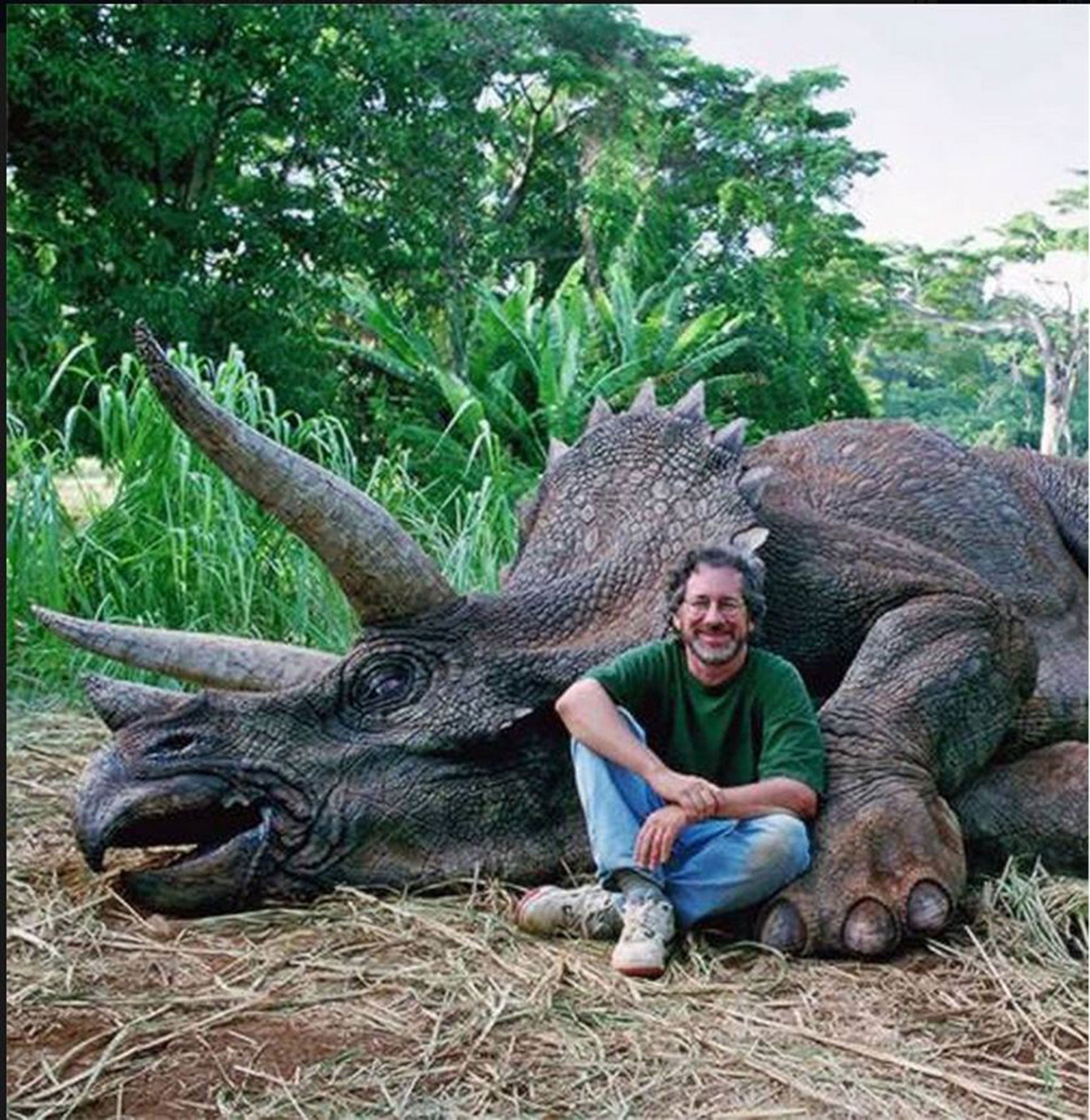 Steven Spielberg on the set of Jurassic Park with a mechanical dinosaur