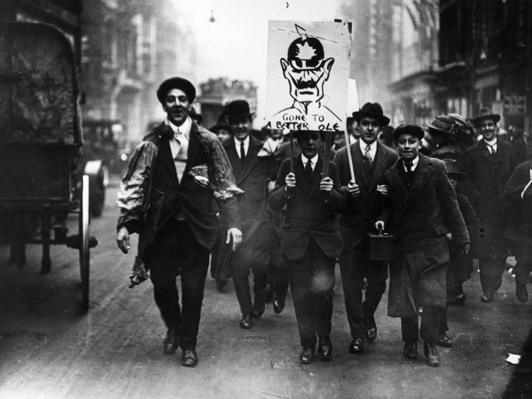 People celebrate in the streets in 1918