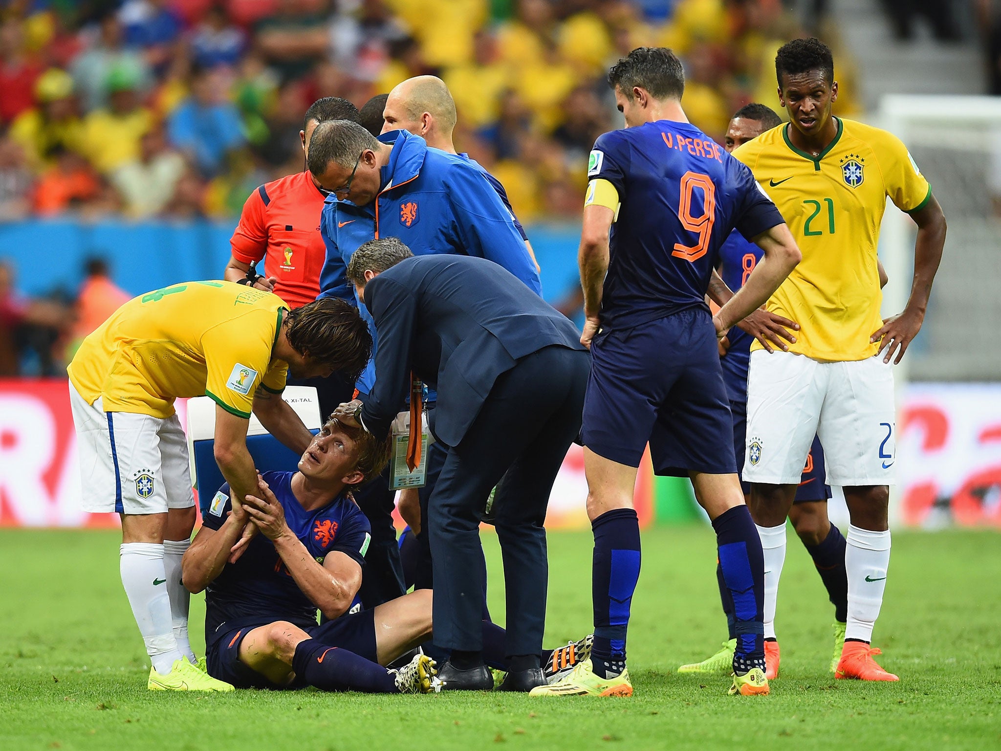 Dirk Kuyt has his head stapled together after an accidental clash with Maxwell