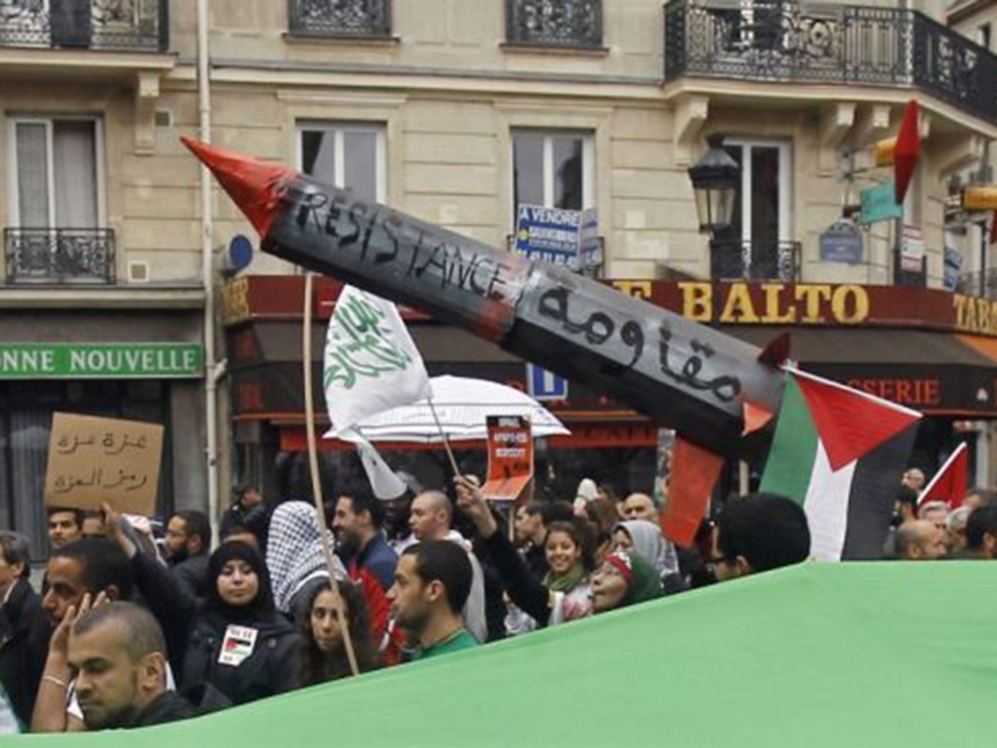 Thousands of pro-Palestinian demonstrators holding banners and chanting anti Israeli slogans march through Paris