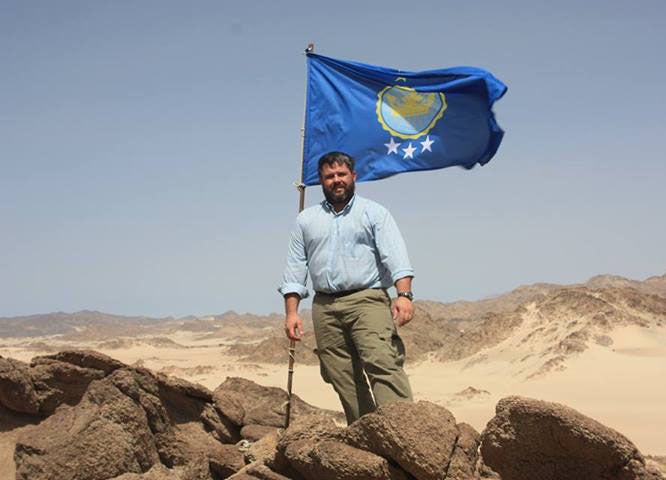 Jeramiah Heaton at the “Kingdom of North Sudan”. (Photo courtesy of Jeramiah Heaton)