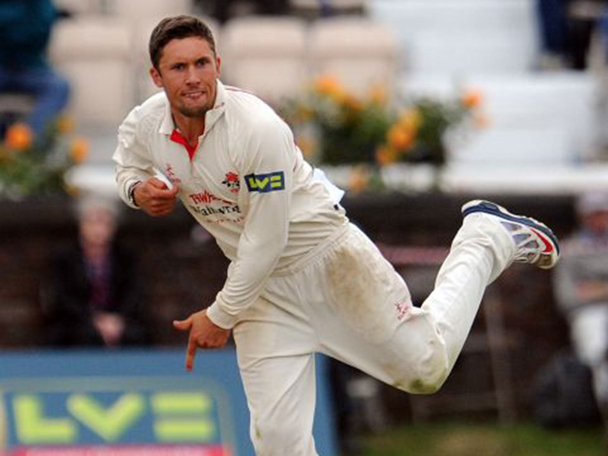 Simon Kerrigan bowls for Lancashire