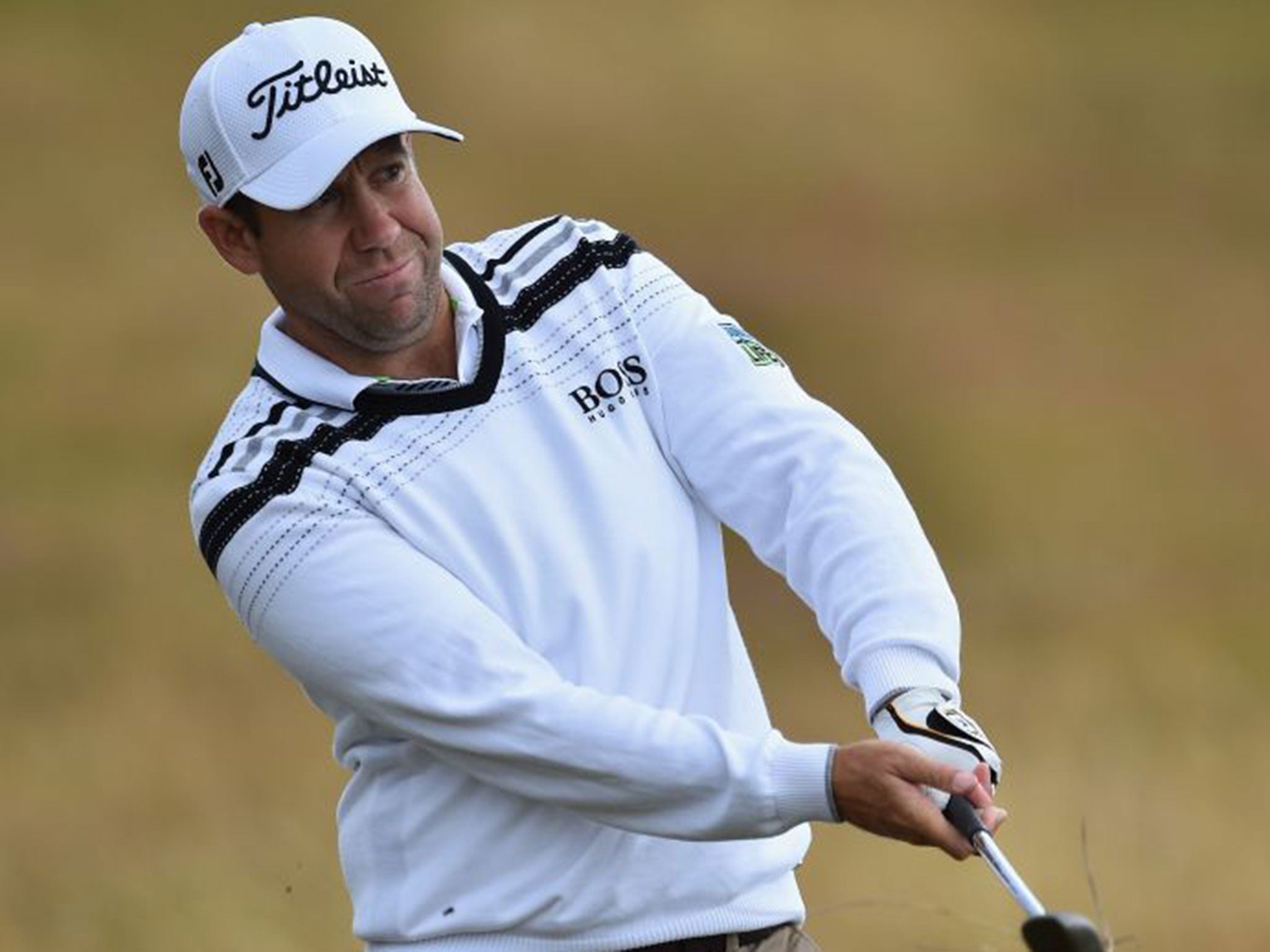 Erik Compton hits a shot during a practice round for The Open which starts at Royal Liverpool on Thursday