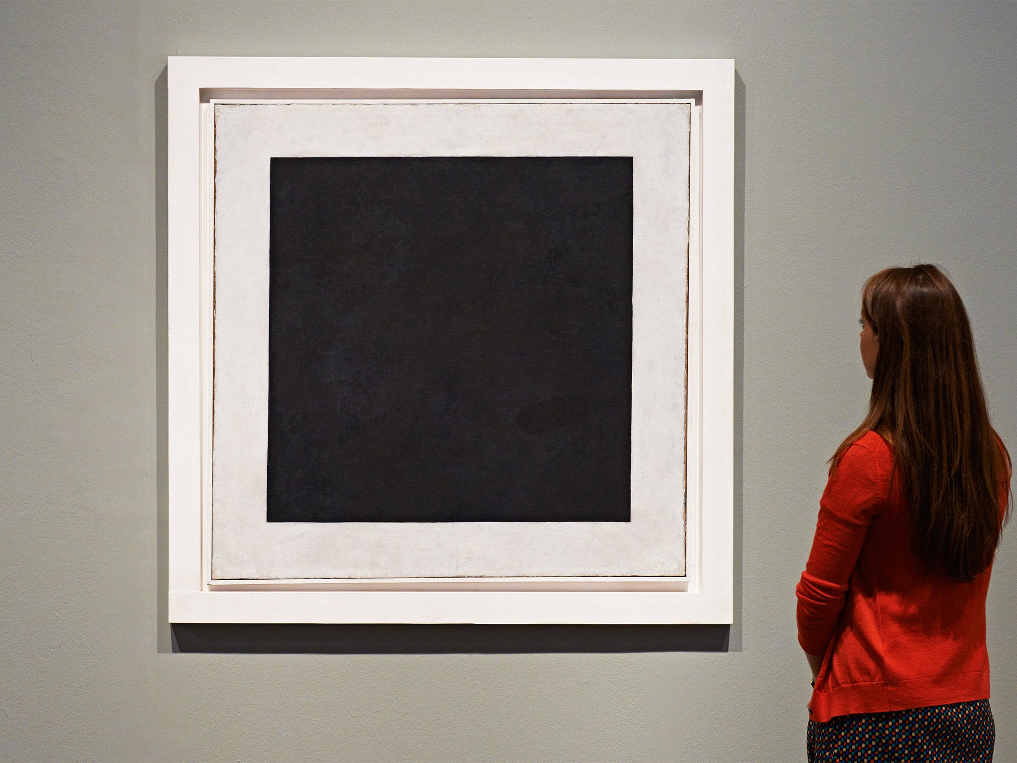 The old black: A visitor looks at Malevich’s ‘Black Square’ at Tate Modern