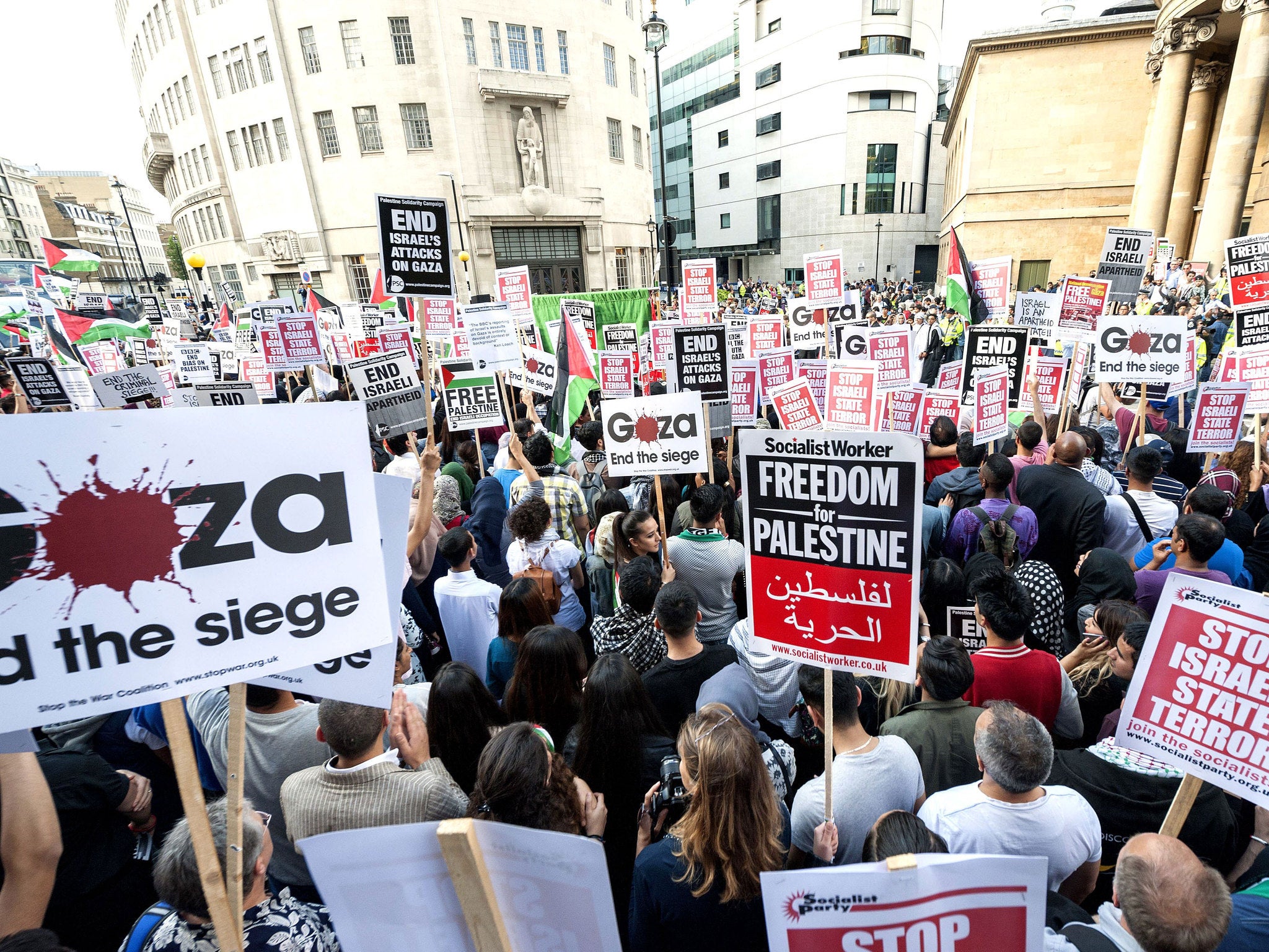 Palestinian and pro-Palestinian demonstrators assemble at the BBC TV Centre in London