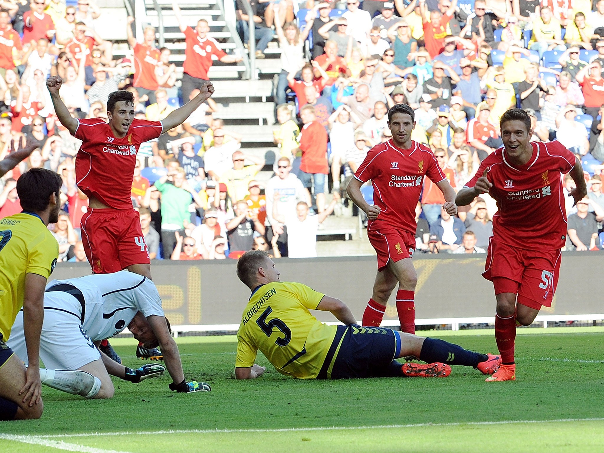 Liverpool teenager Kristoffer Peterson celebrates after equalising