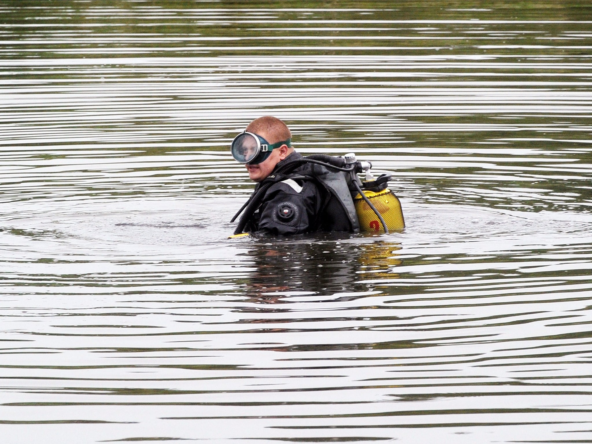 A diver searches for a black box on the site of the crash of a Malaysian airliner near the town of Shaktarsk, in rebel-held east Ukraine