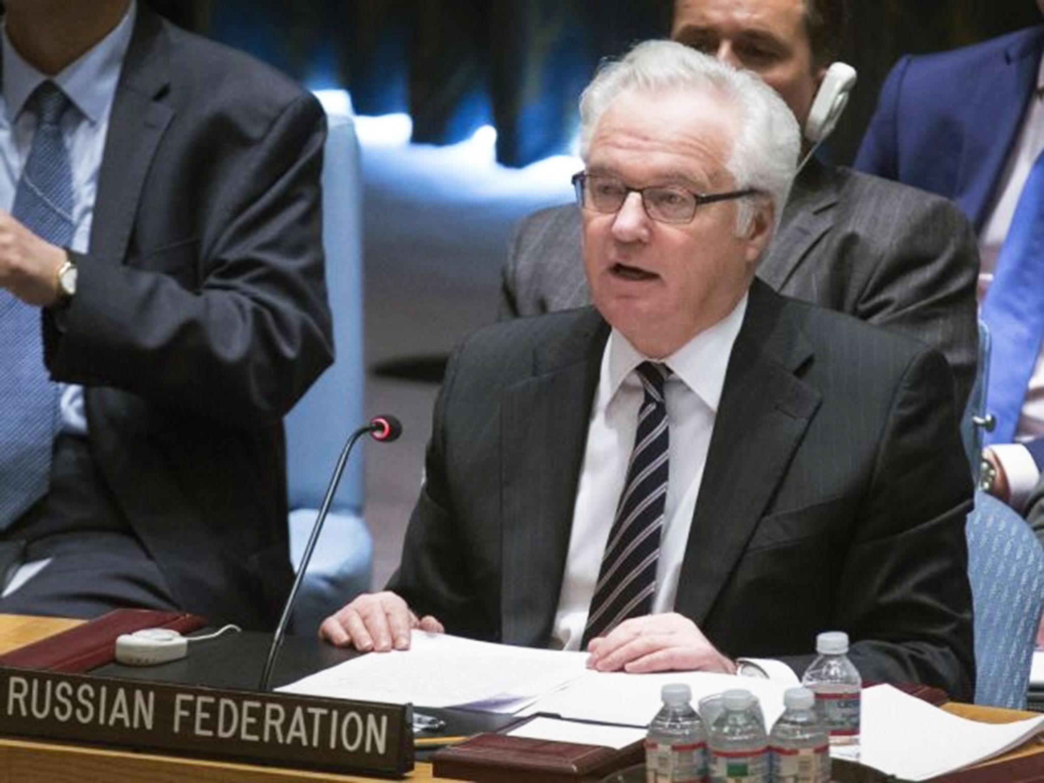 Russian UN Ambassador Vitaly Churkin addresses an emergency UN Security Council meeting