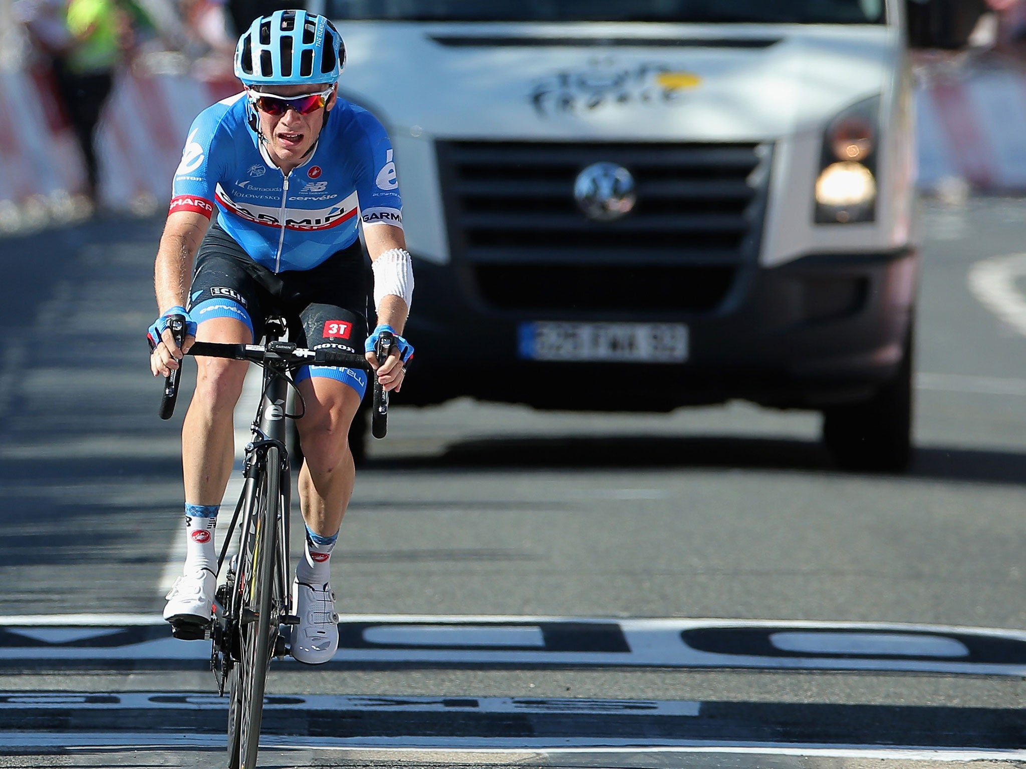 Andrew Talansky grimaces as he completes stage 11. He was later forced to withdraw from the tour