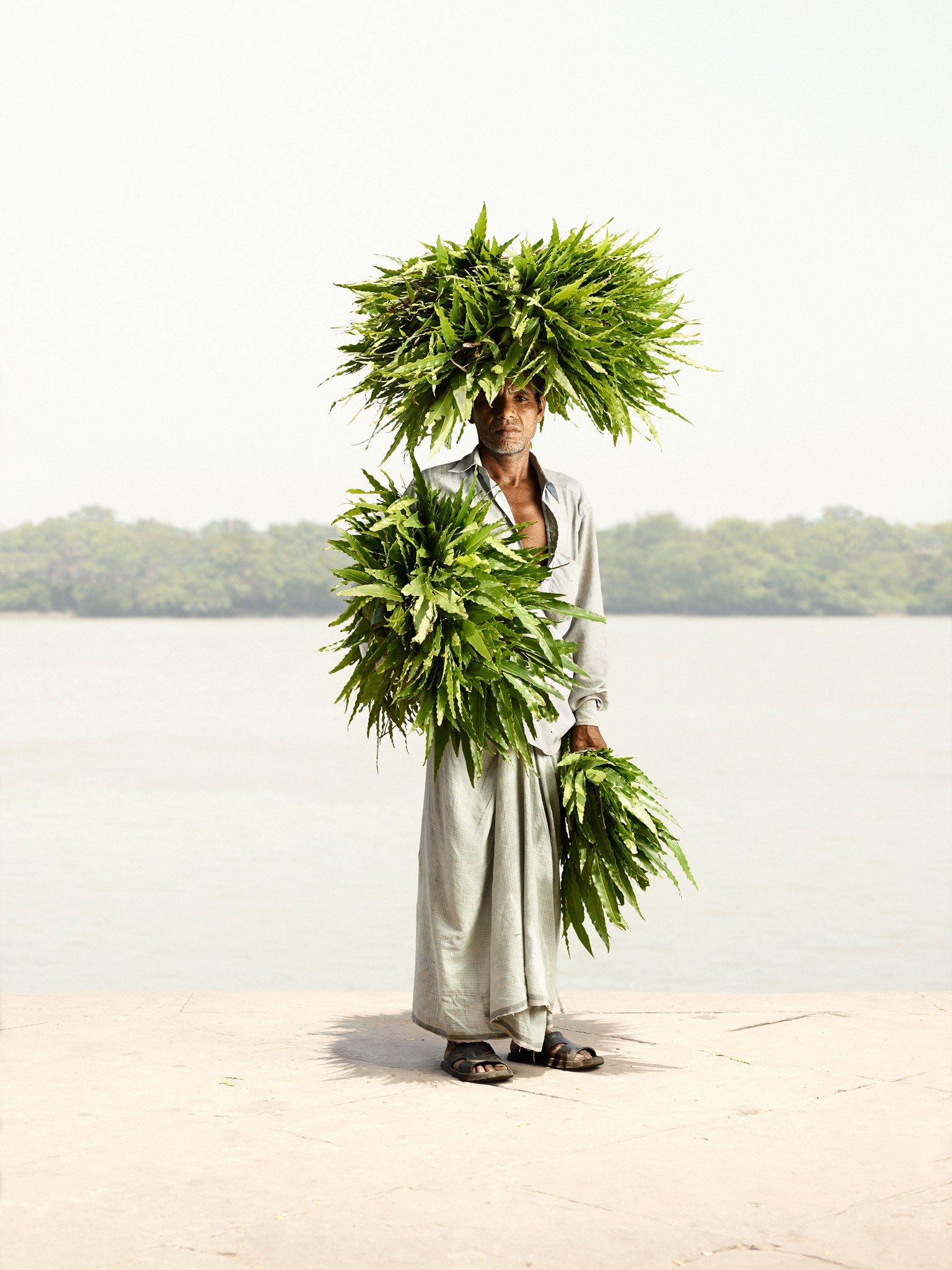 Hermann took the men down to the Hooghly river for a more neutral setting, allowing the colour of the seller's wares to stand out all the more