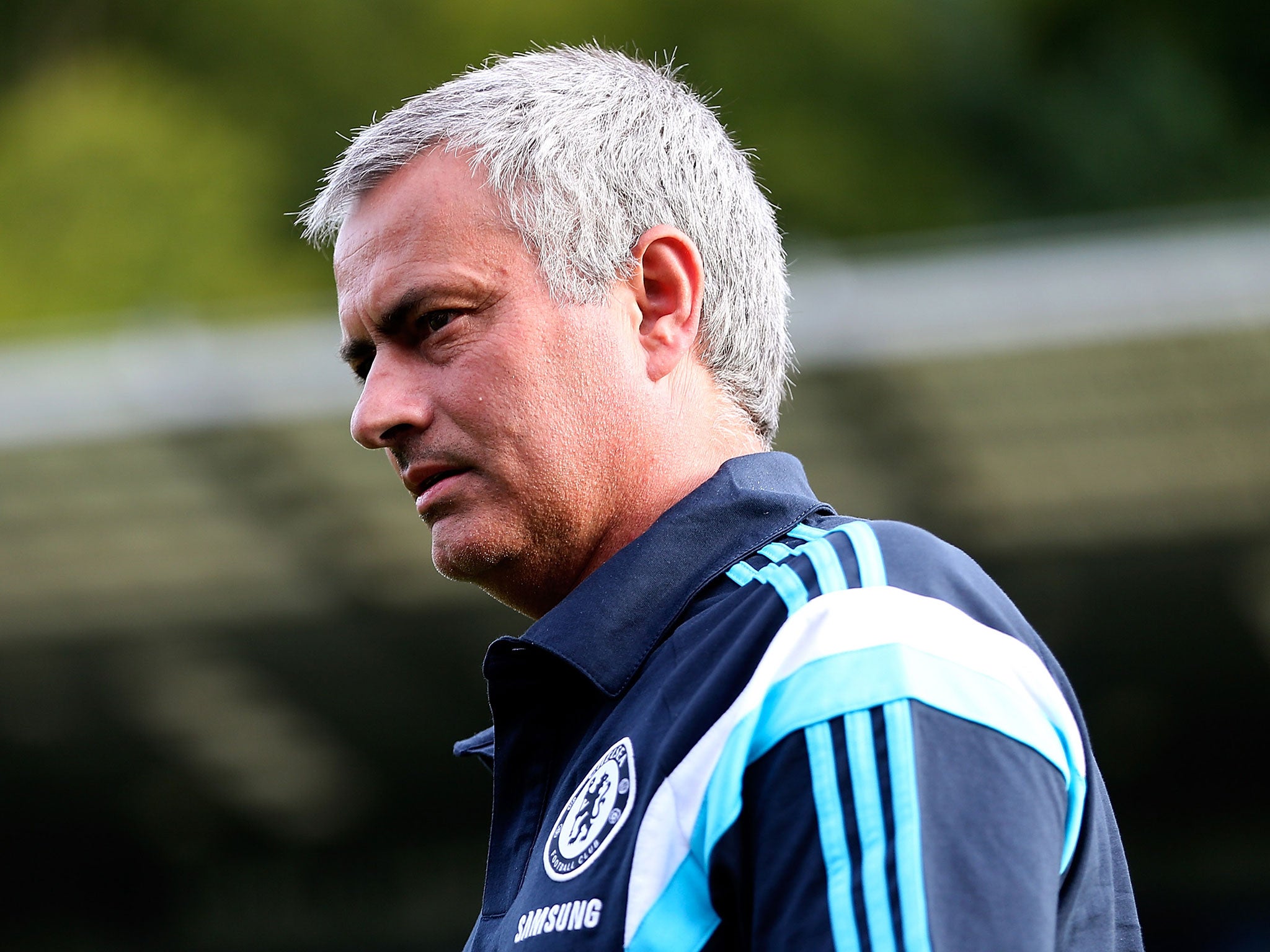 Jose Mourinho watches his Chelsea team in pre-season action against Wycombe