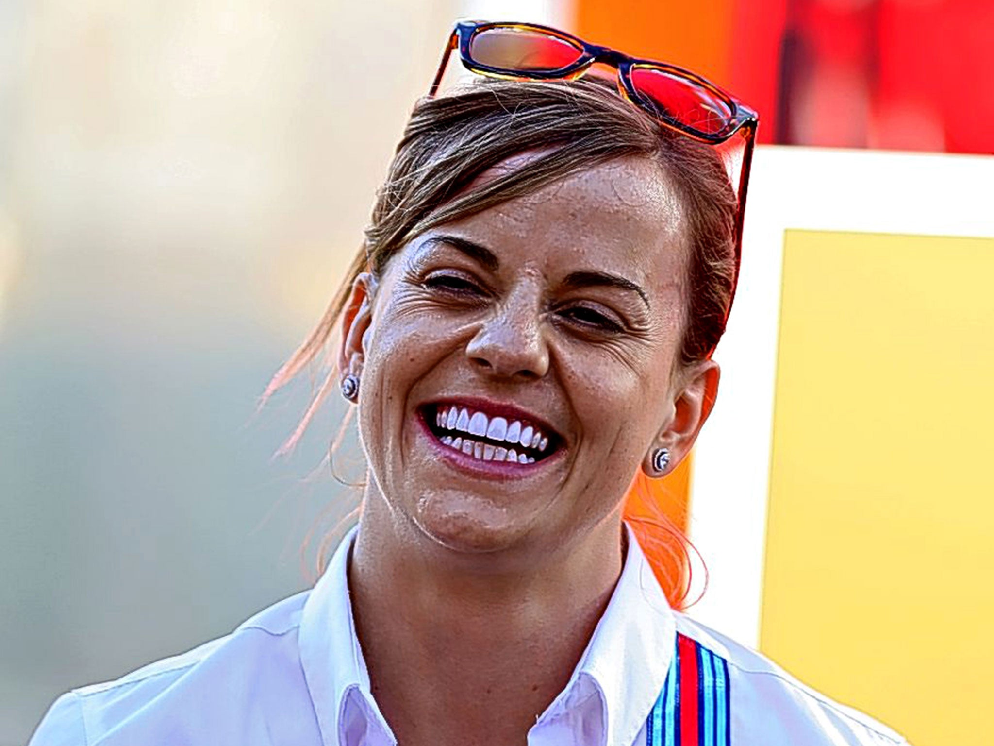 Susie Wolff smiles after her run in Friday practice at Hockenheim