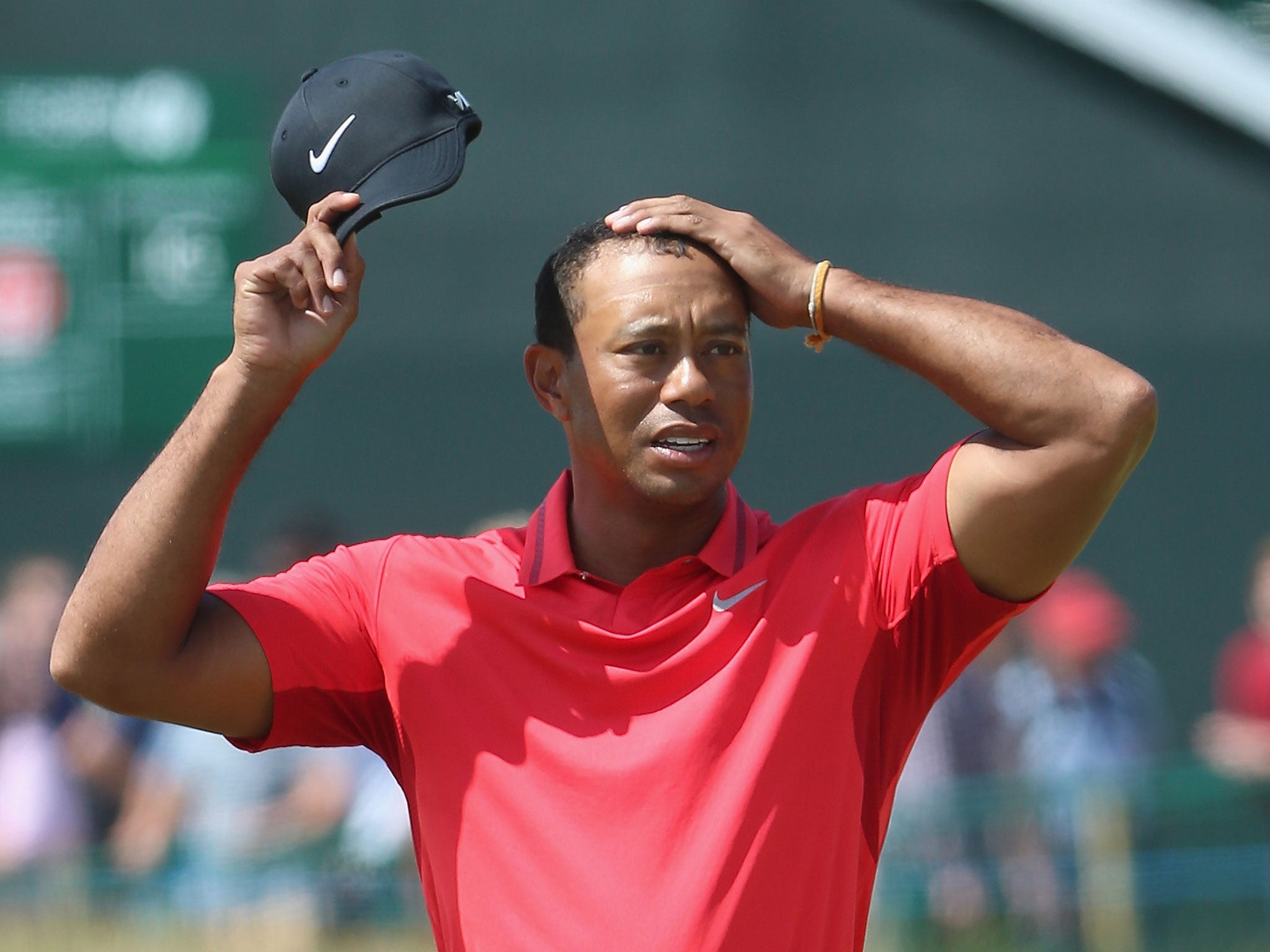 Tiger Woods looks on at the 18th hole on Sunday