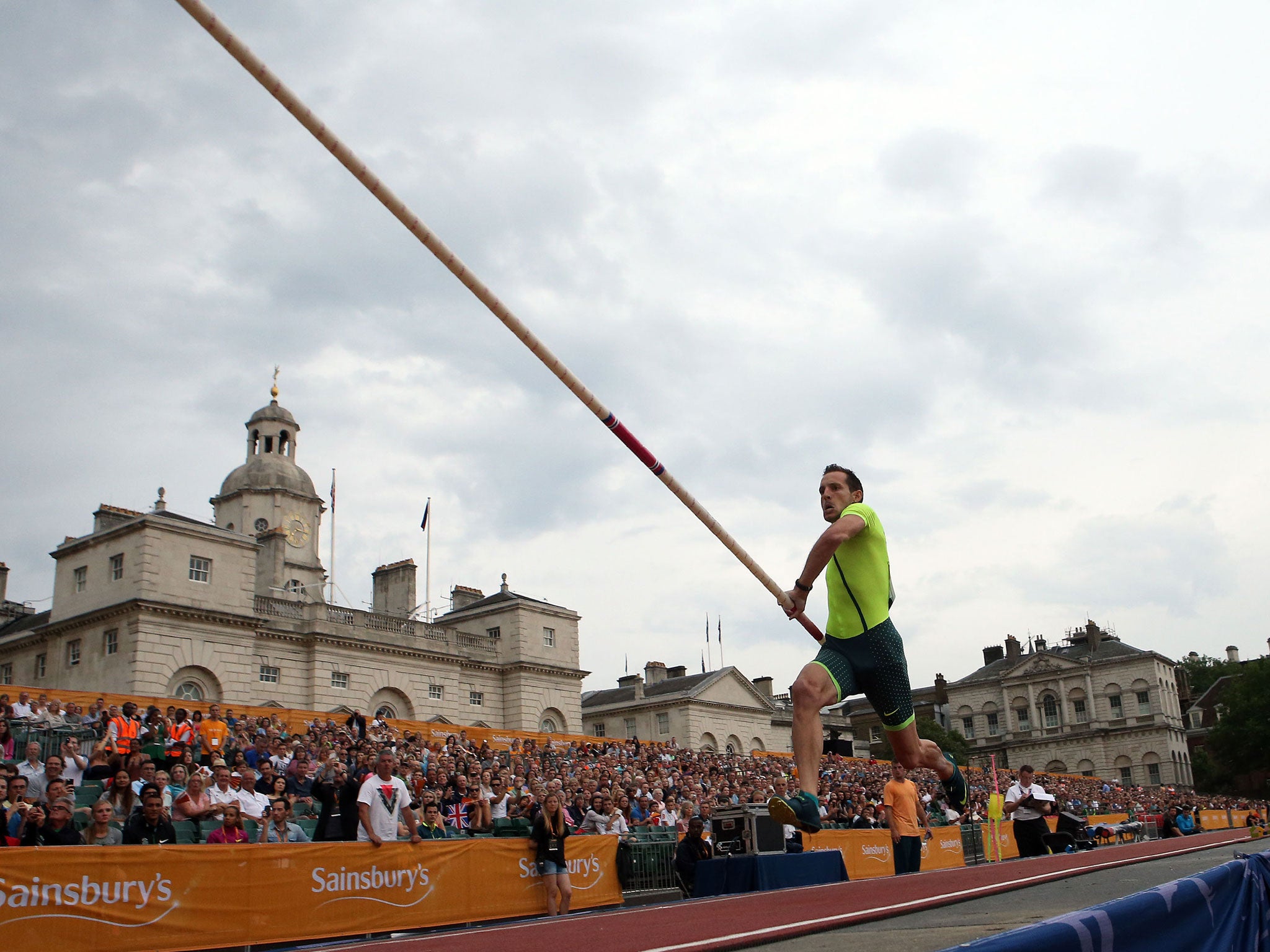 France’s Renaud Lavillenie on his way to winning the men’s pole vault, during the Anniversary Games at Horse Guards Parade