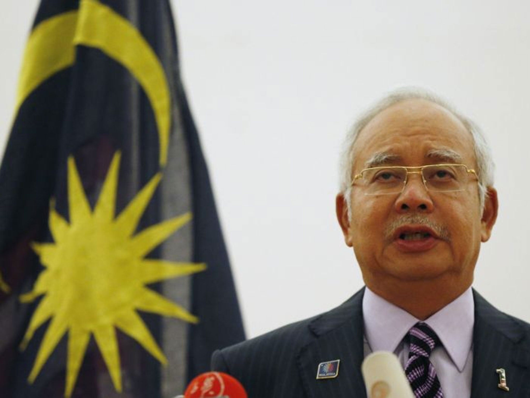 Malaysian Prime Minister Najib Razak announces rebels will hand over the two black boxes (Reuters)