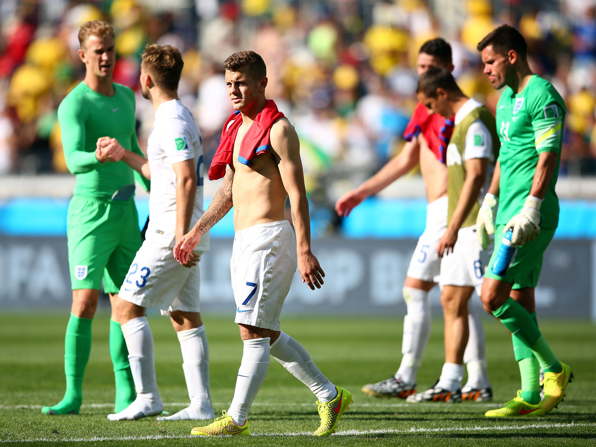 England players trudge off after their dismal exit from the World Cup