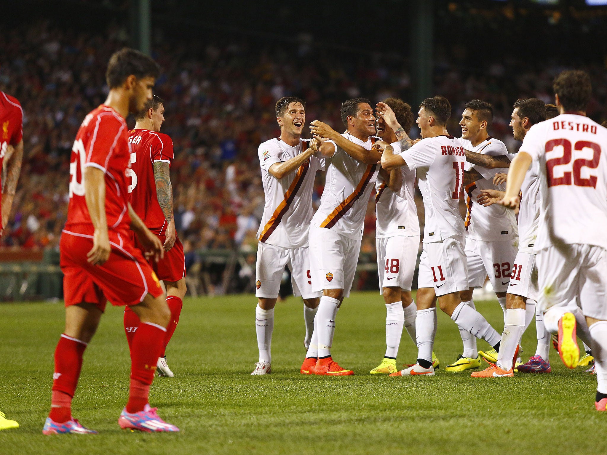 Roma celebrate Marco Boriello's last-minute strike that gave the Italian's a 1-0 win over Liverpool