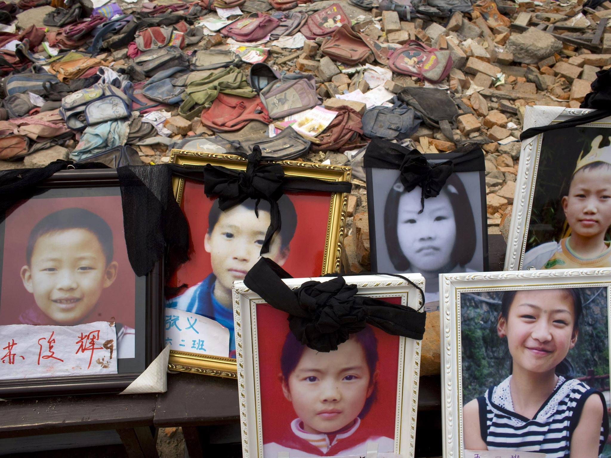 Pictures of some of the children who were killed in the earthquake in Sichuan province in 2008