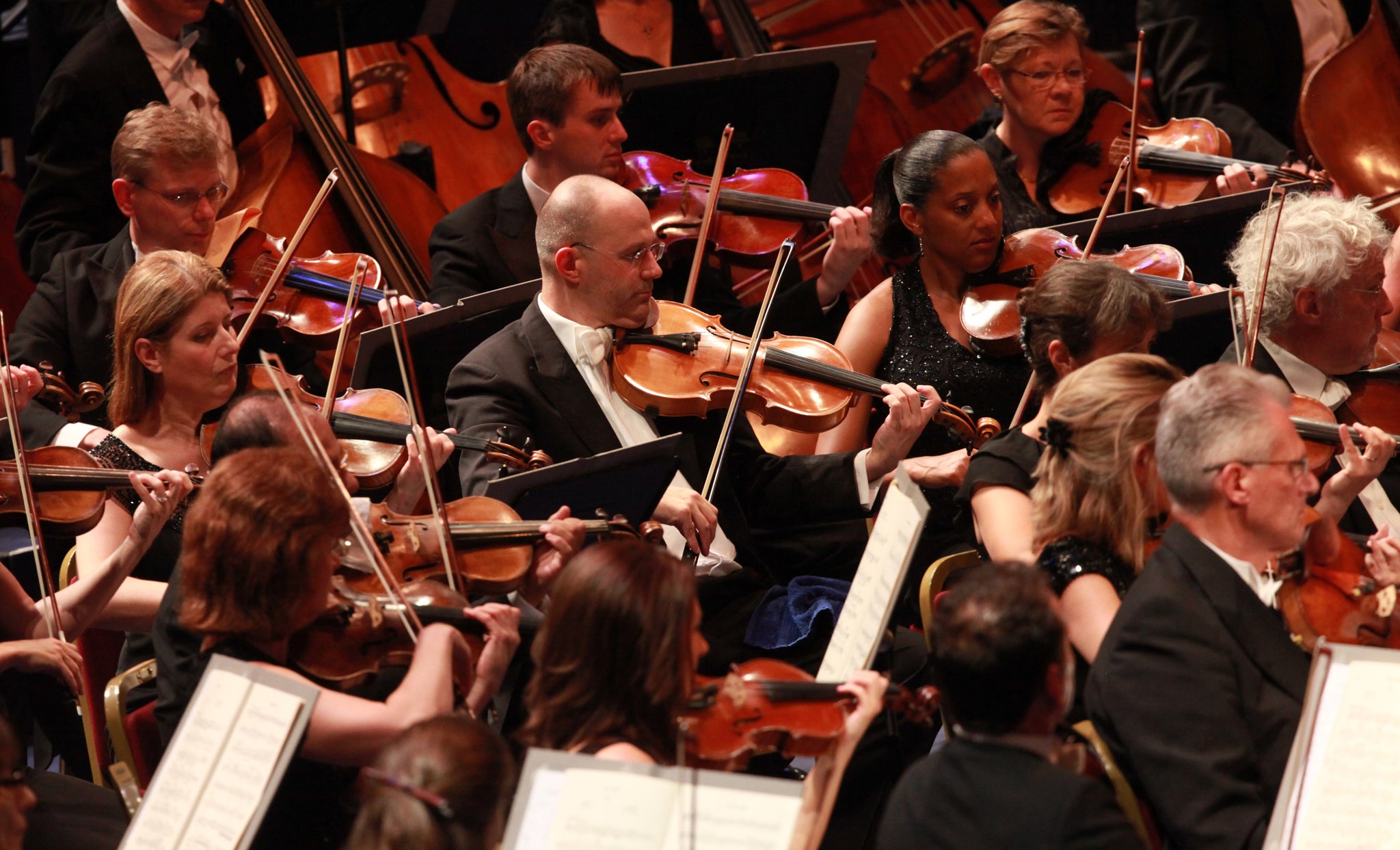 The string sections plays during the first night of the Proms, 2014