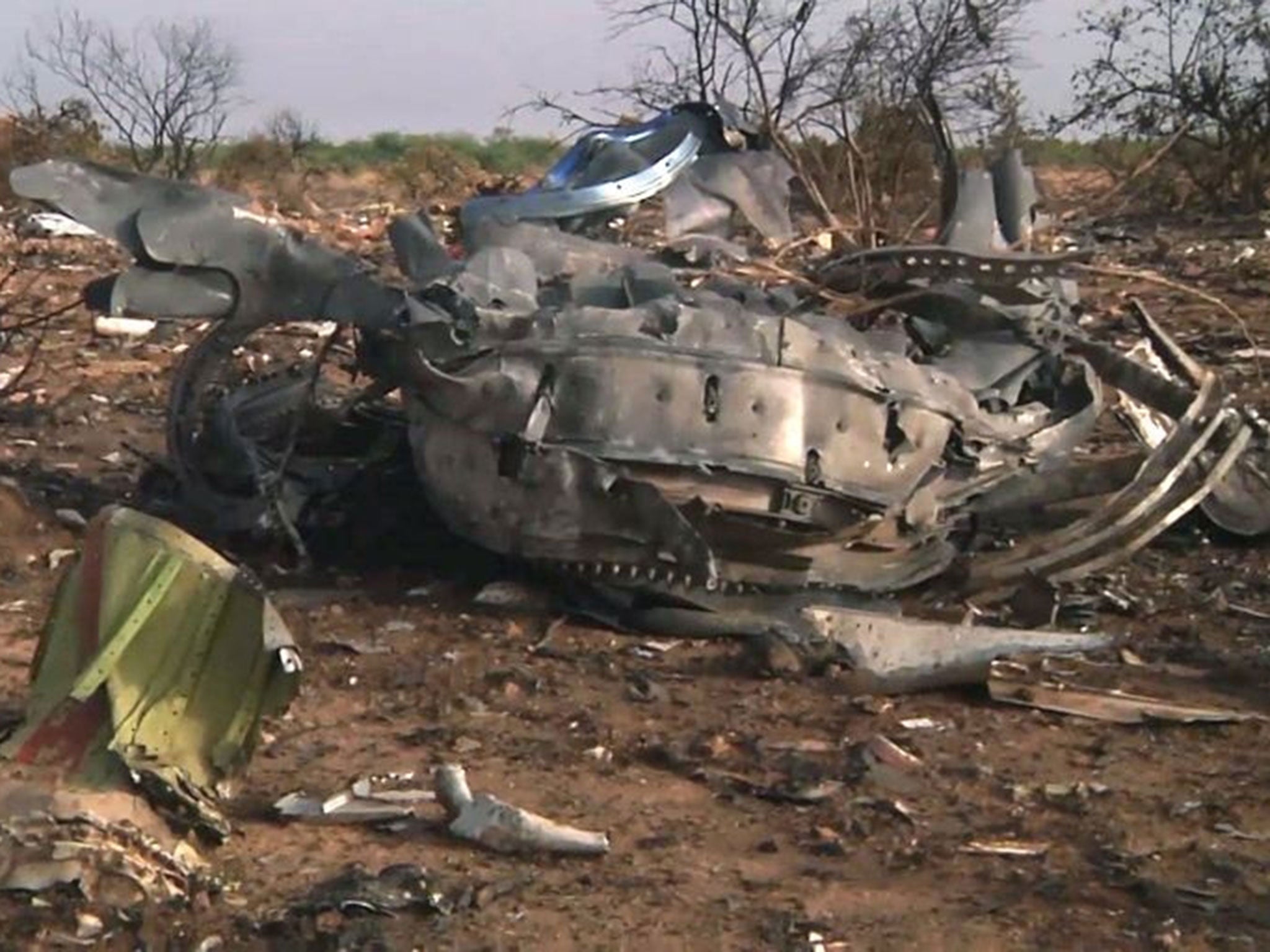 Debris at the crash site of the Air Algerie flight AH5017 in Mali's Gossi region, west of Gao.