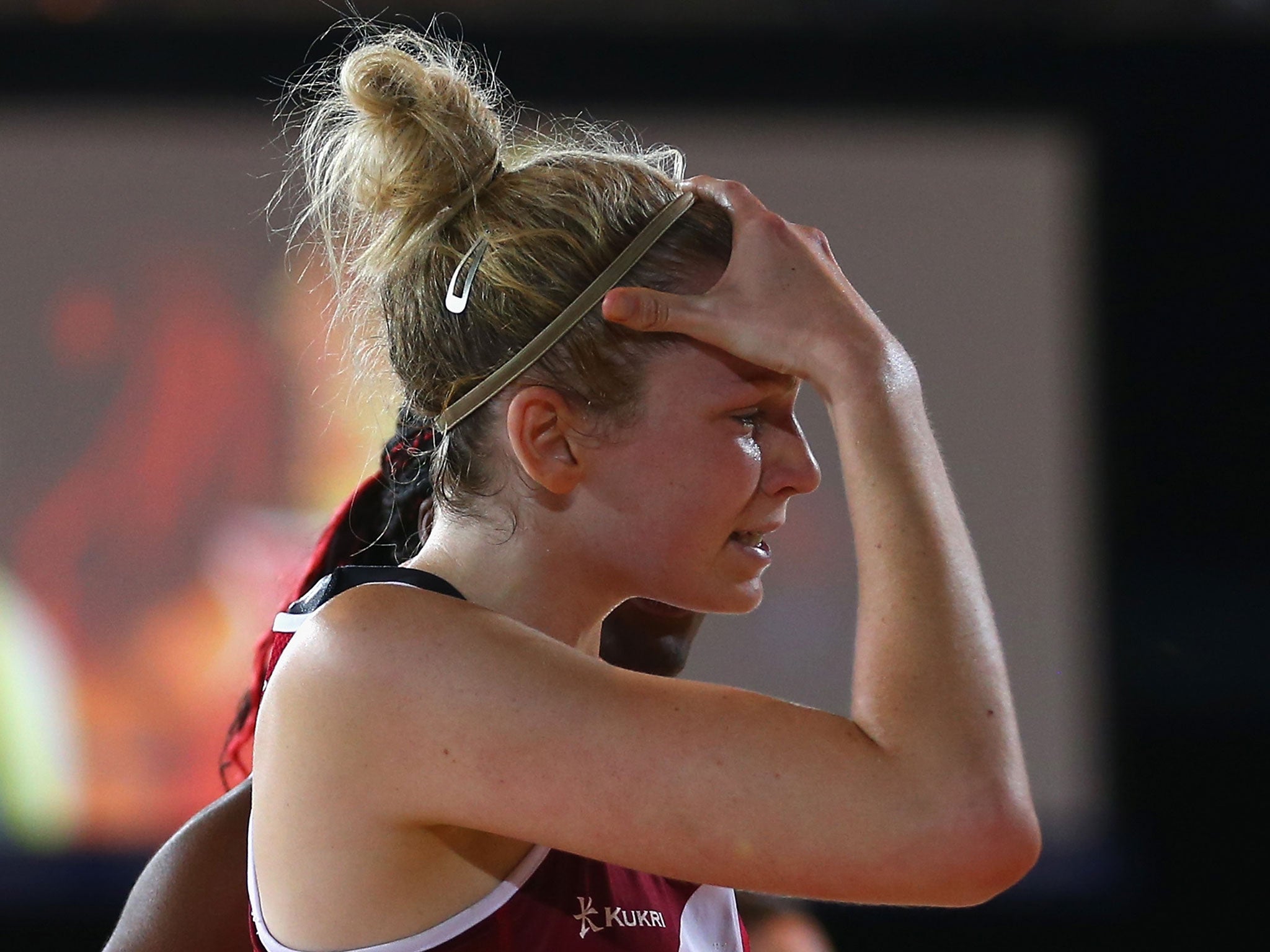 Joanna Harten bursts into tears after England go down 49-48 in the netball