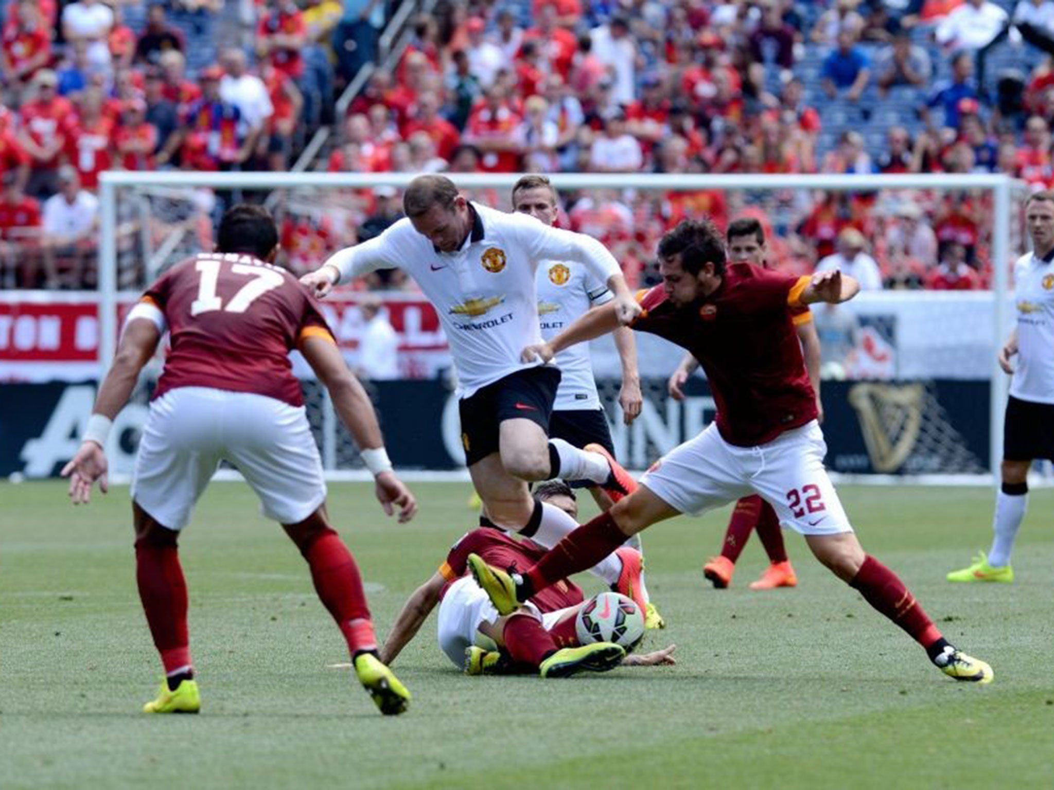 Wayne Rooney in action against Roma