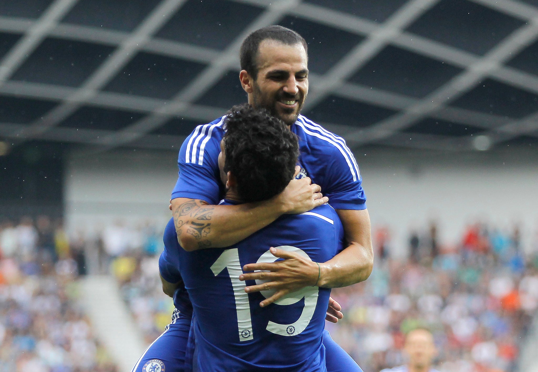 Diego COsta celebrates with Cesc Fabregas